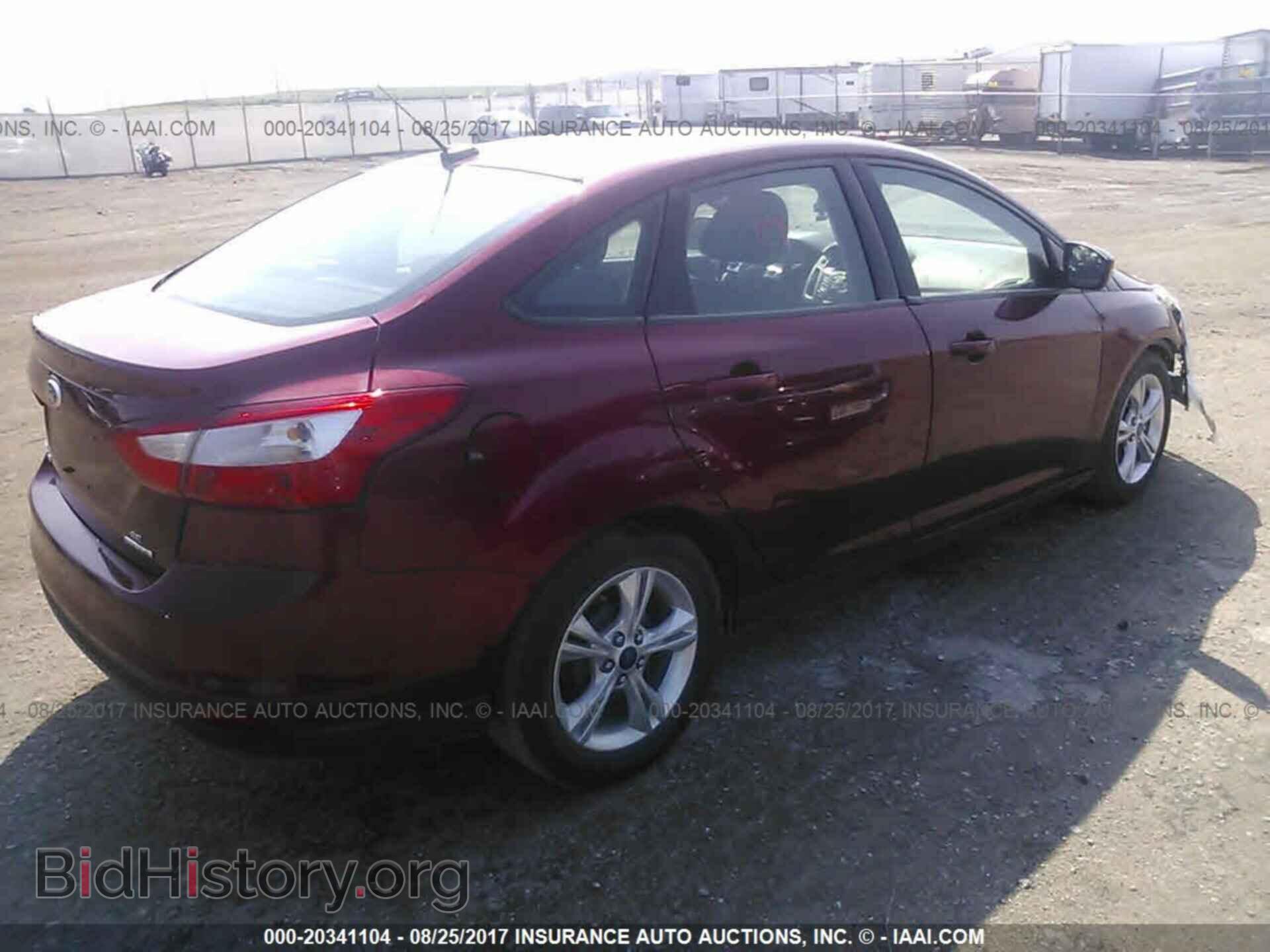 2014 Ford Focus - VIN: 1FADP3F20EL209239 - Фото 4