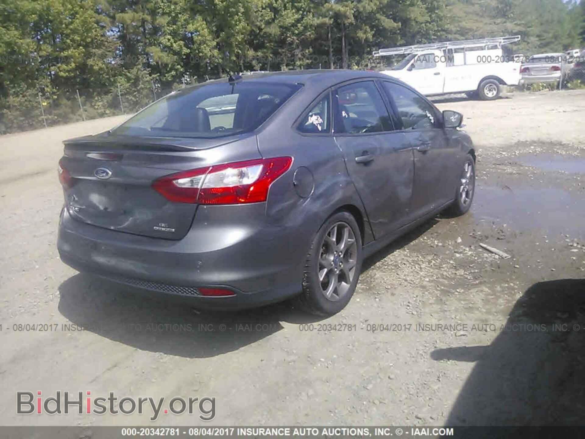 2014 Ford Focus - VIN: 1FADP3F29EL115666 - Photo 4