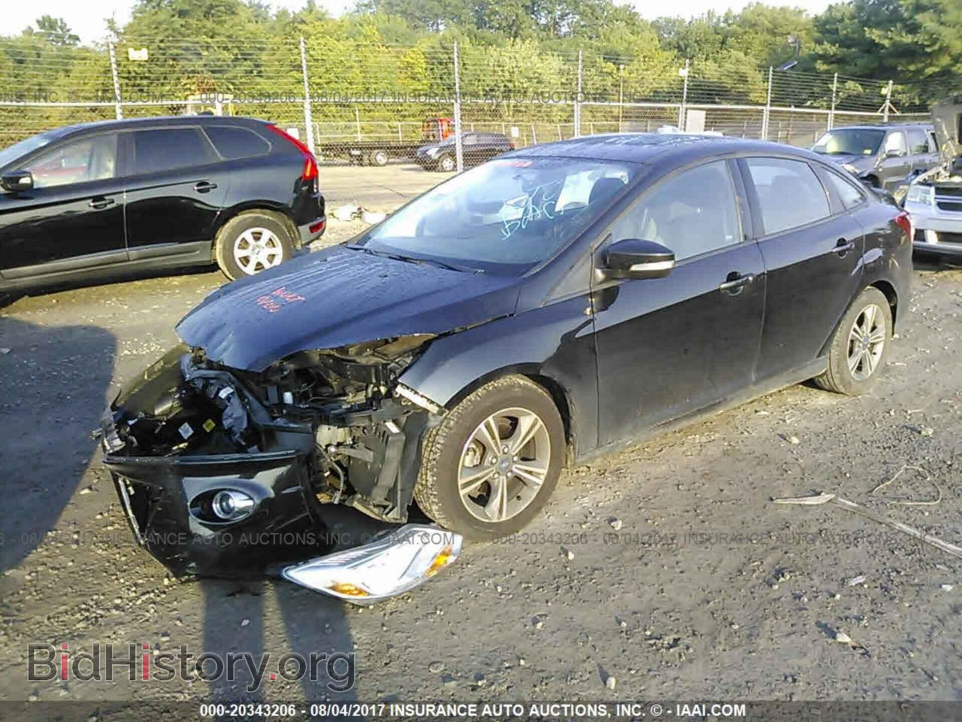 2014 Ford Focus - VIN: 1FADP3F2XEL366244 - Фото 2