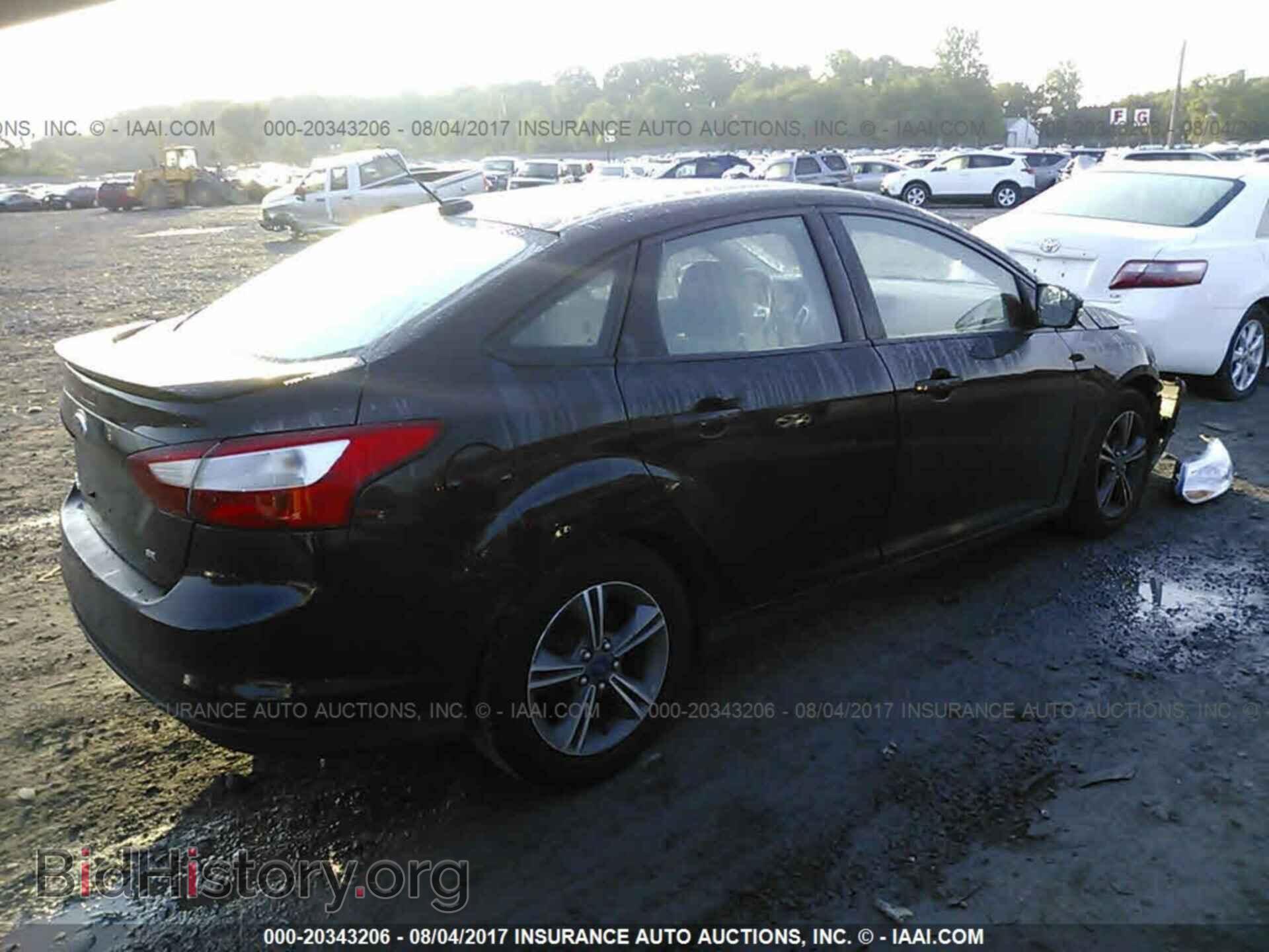 2014 Ford Focus - VIN: 1FADP3F2XEL366244 - Фото 4