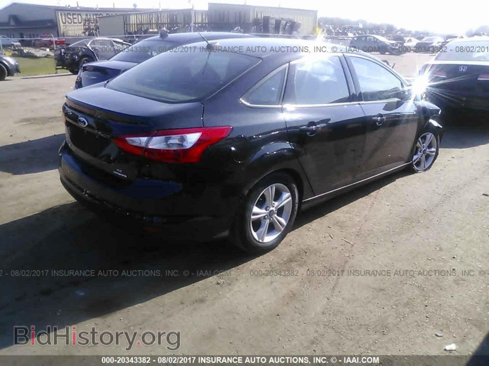 2014 Ford Focus - VIN: 1FADP3F23EL429202 - Photo 4