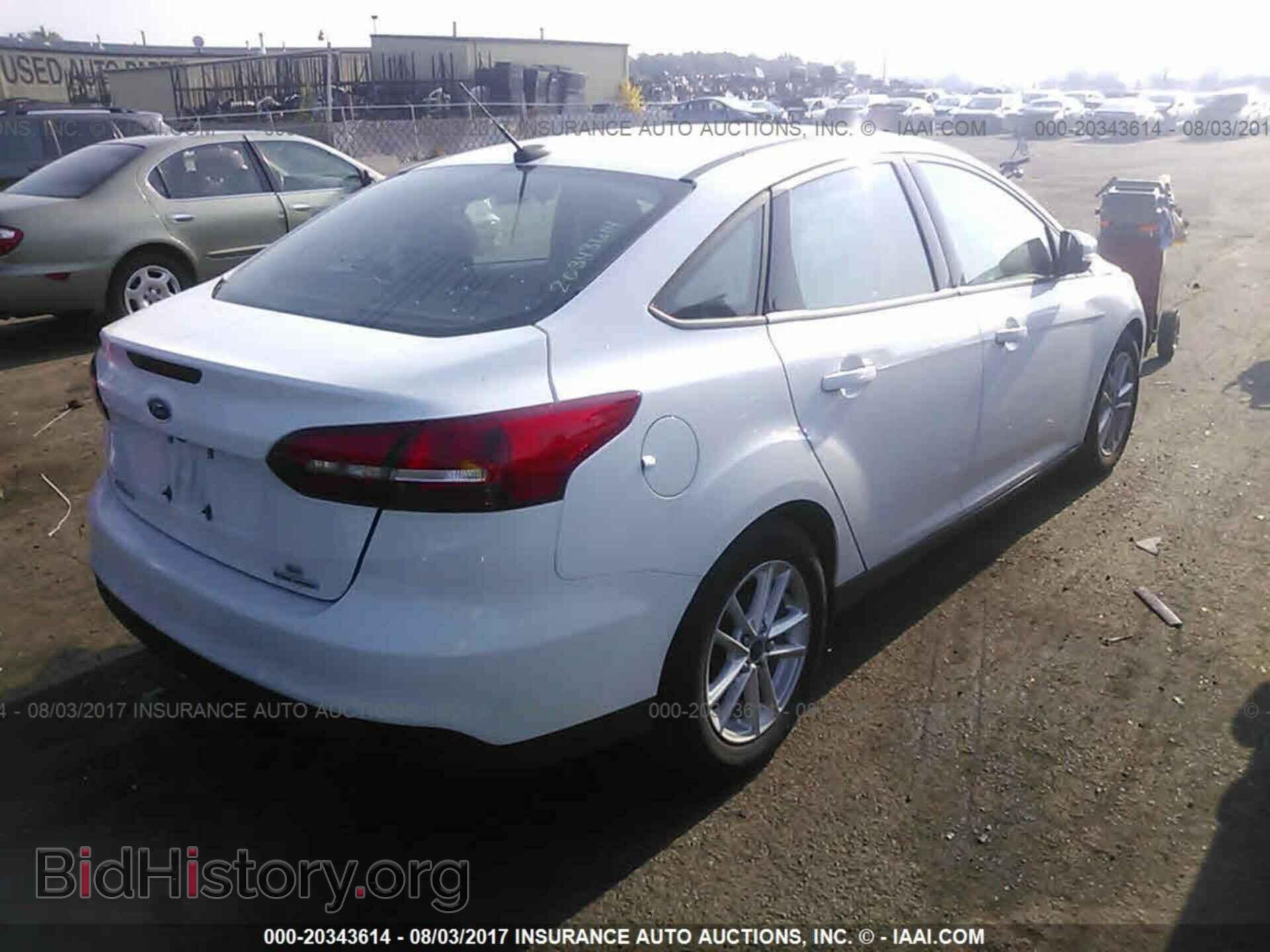 2016 Ford Focus - VIN: 1FADP3F21GL398227 - Photo 4