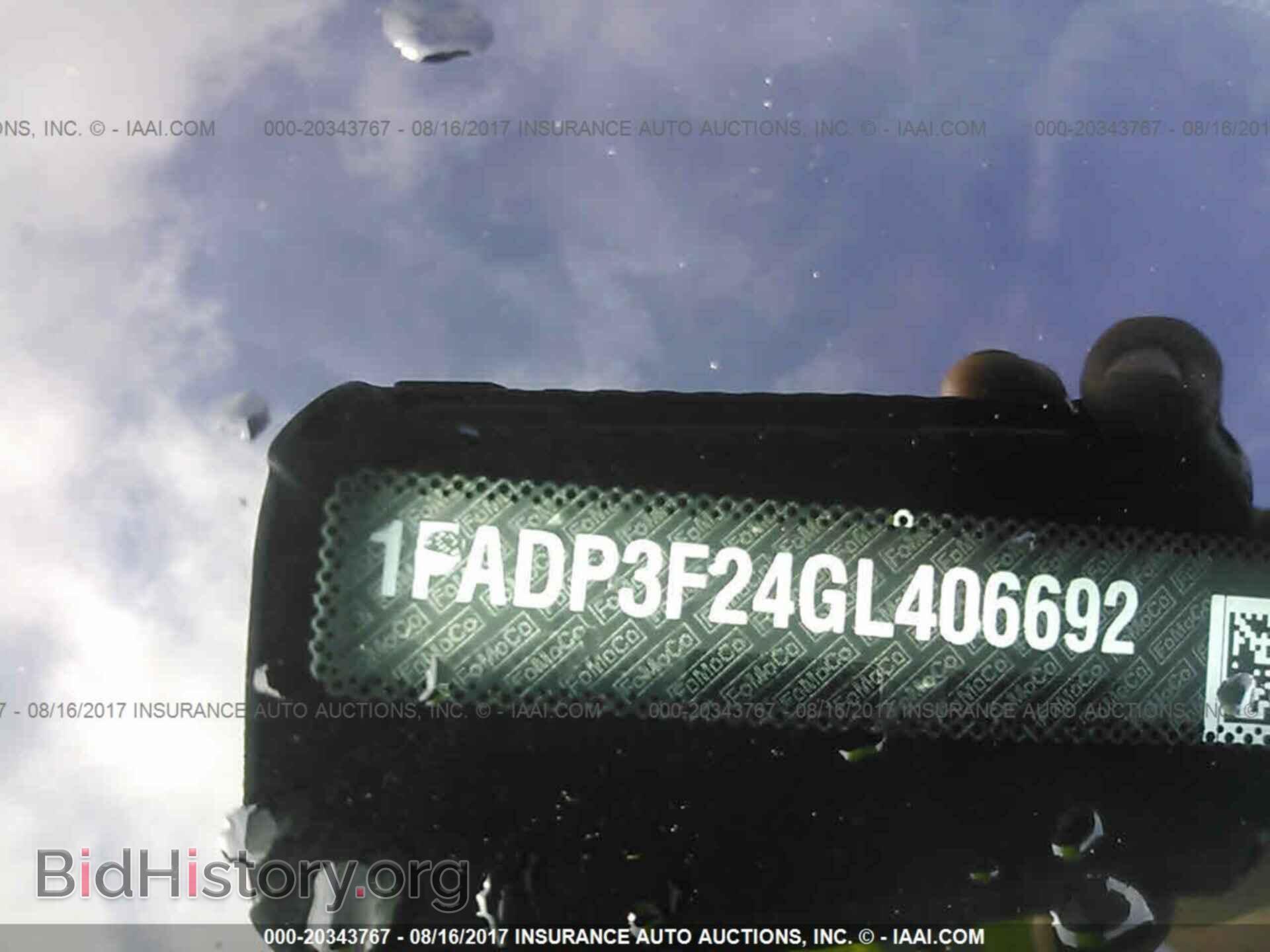 2016 Ford Focus - VIN: 1FADP3F24GL406692 - Photo 9