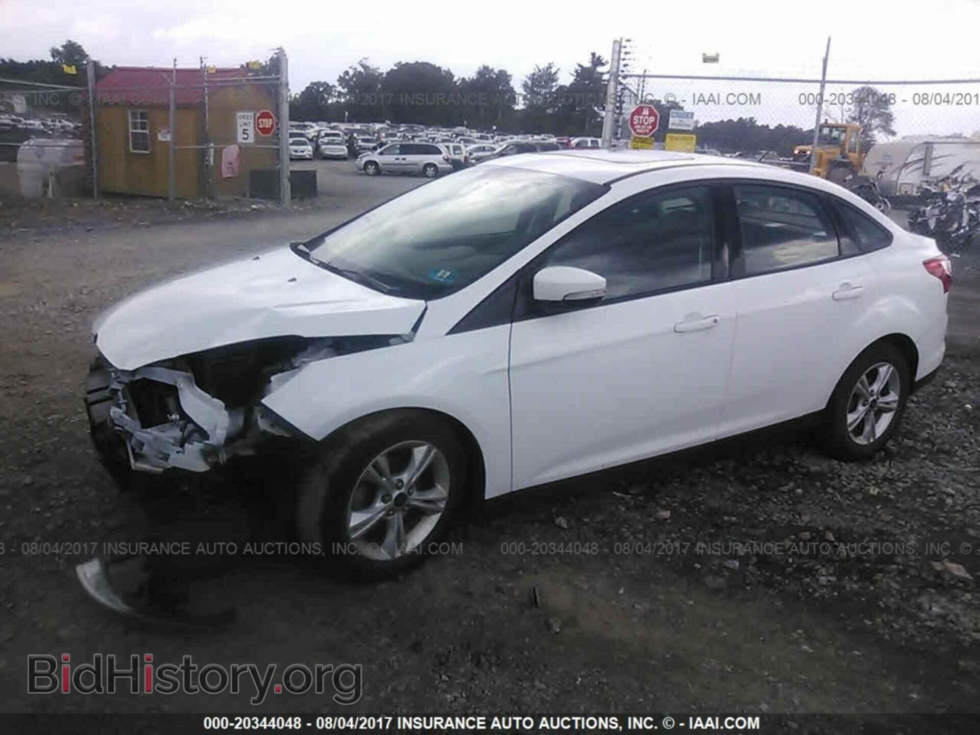 2014 Ford Focus - VIN: 1FADP3F20EL425818 - Фото 2