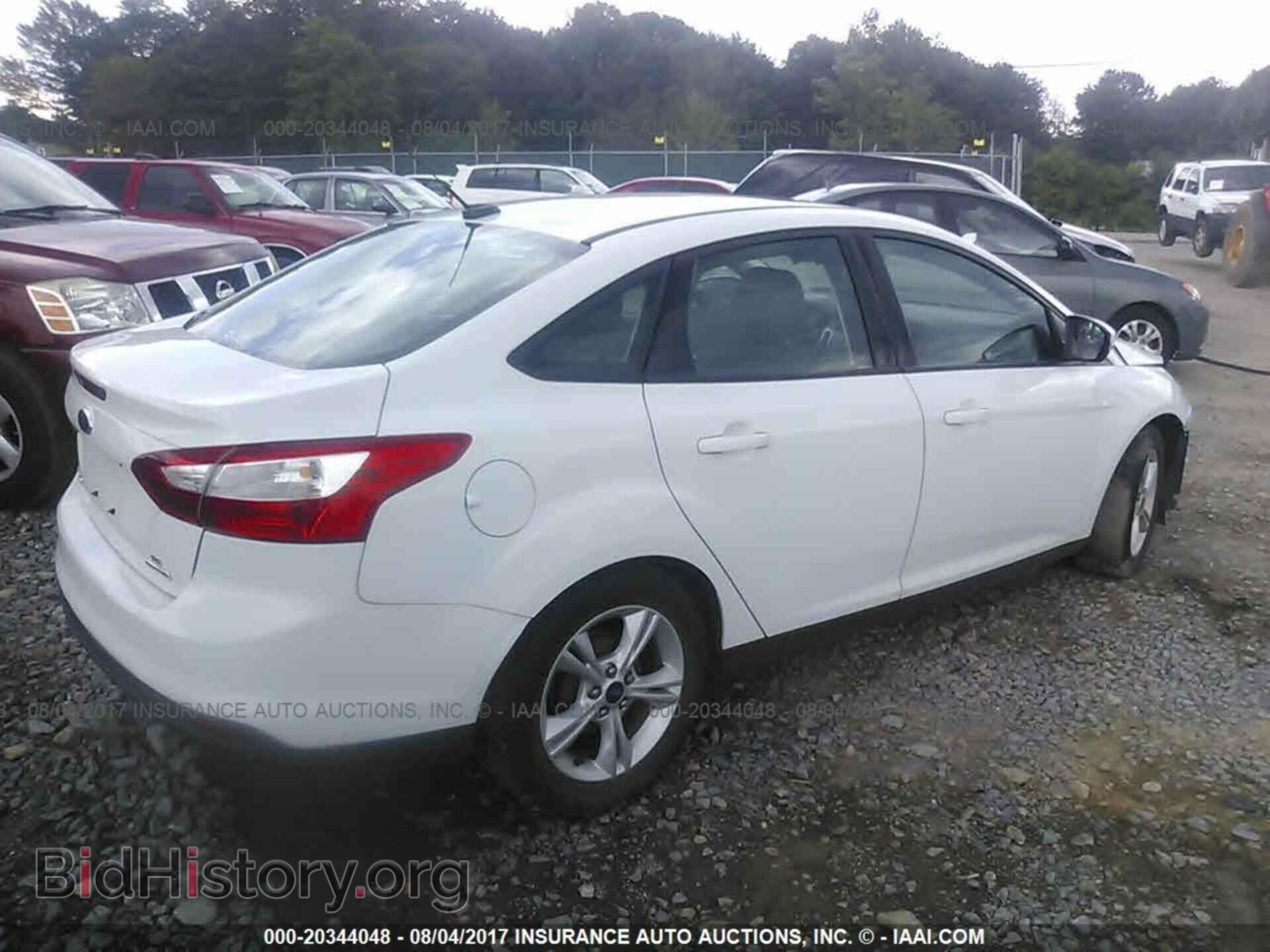 2014 Ford Focus - VIN: 1FADP3F20EL425818 - Фото 4