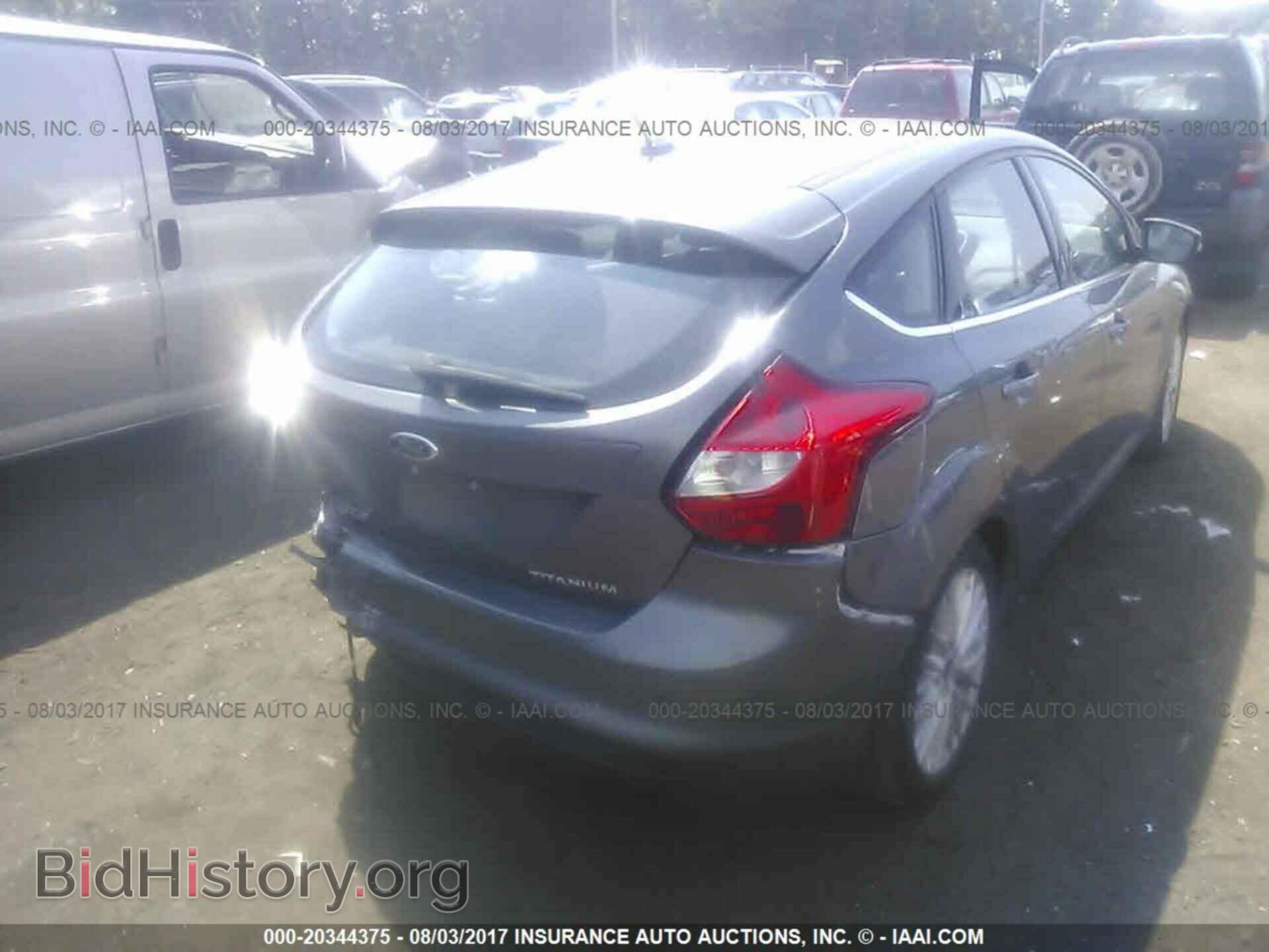 2014 Ford Focus - VIN: 1FADP3N28EL153438 - Photo 4