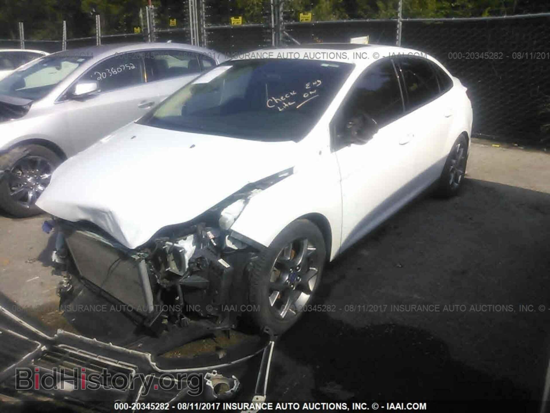 2014 Ford Focus - VIN: 1FADP3F26EL229740 - Photo 2