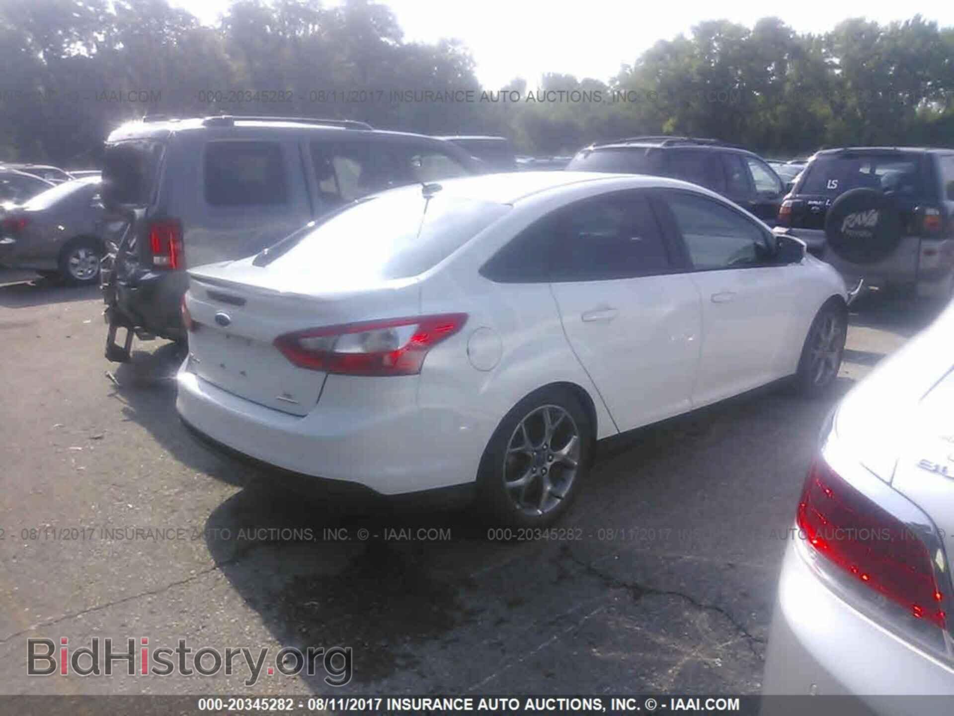 2014 Ford Focus - VIN: 1FADP3F26EL229740 - Photo 4