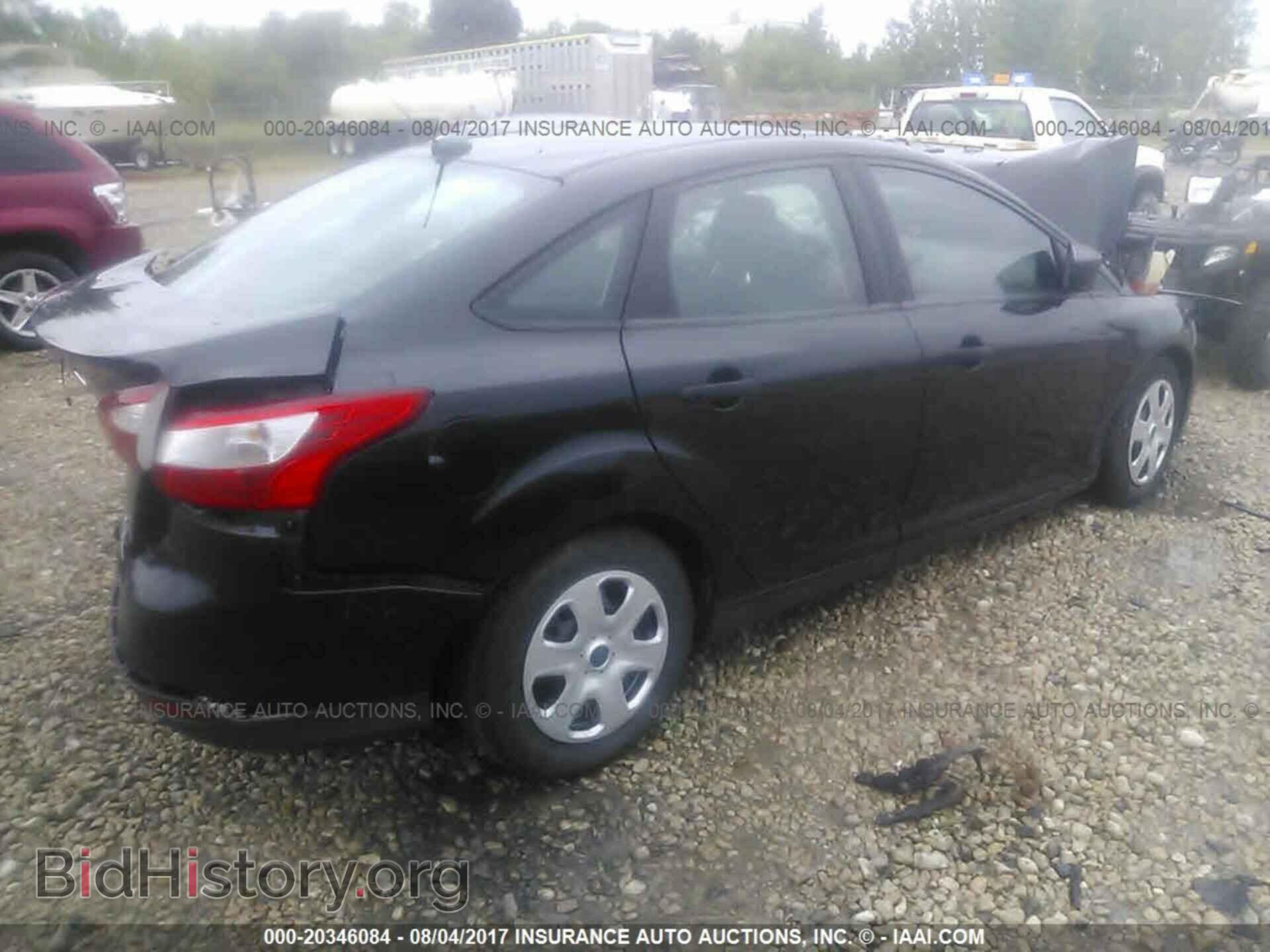 2014 Ford Focus - VIN: 1FADP3E28EL192580 - Photo 4