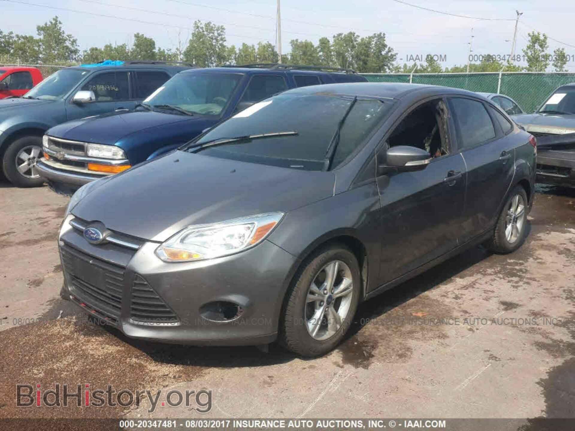 2014 Ford Focus - VIN: 1FADP3F24EL205758 - Фото 2