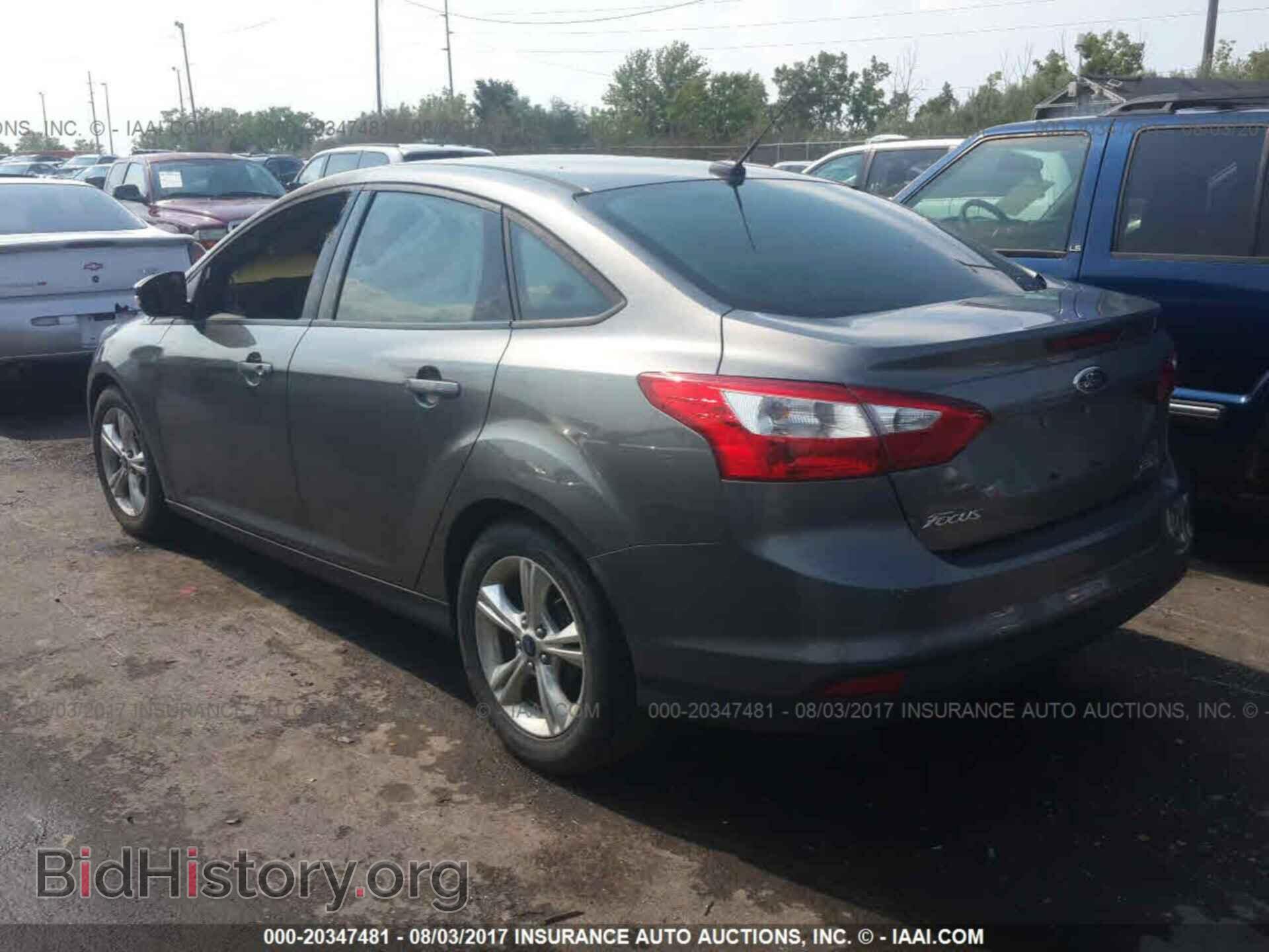 2014 Ford Focus - VIN: 1FADP3F24EL205758 - Фото 3