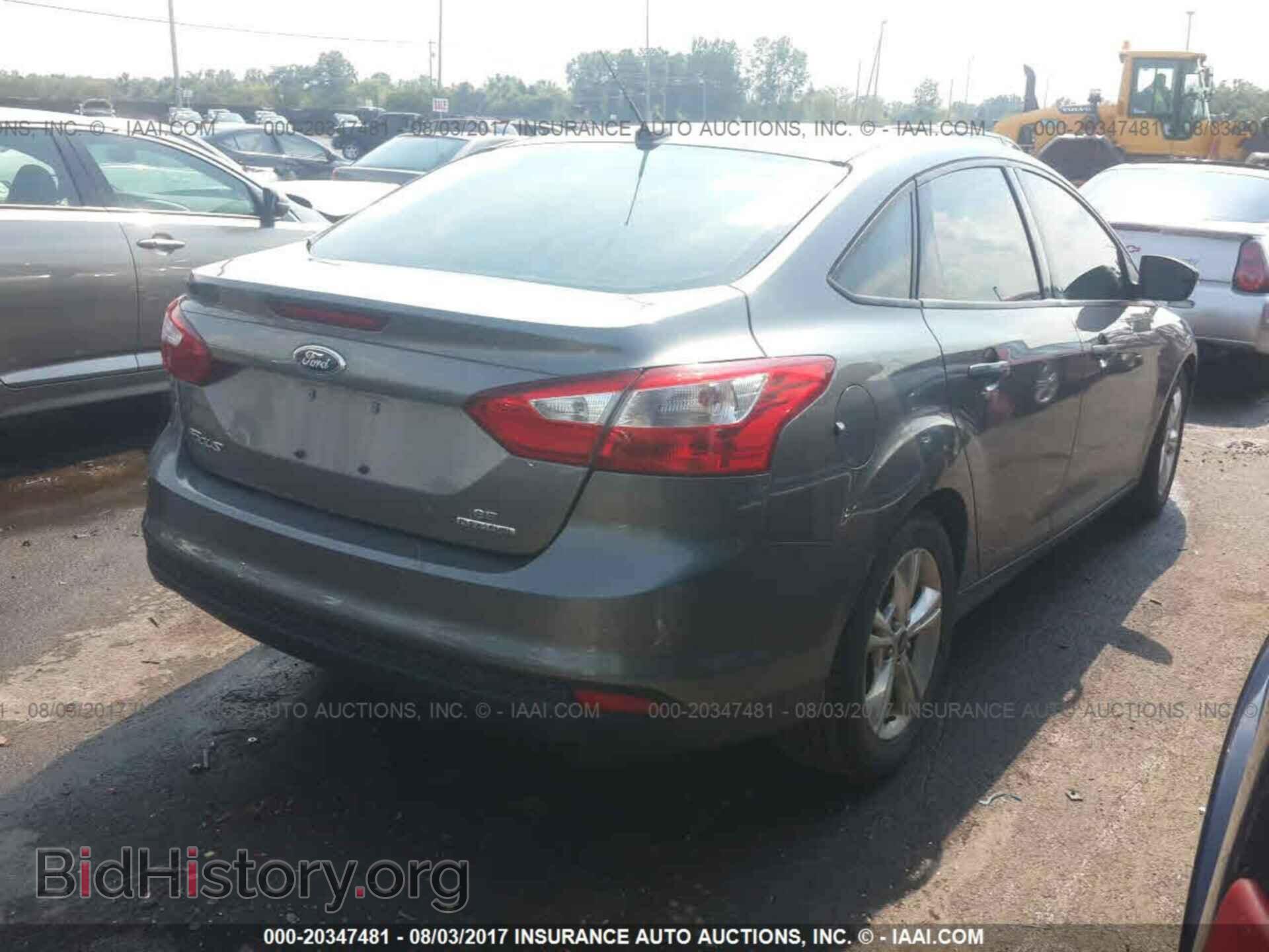 2014 Ford Focus - VIN: 1FADP3F24EL205758 - Фото 4