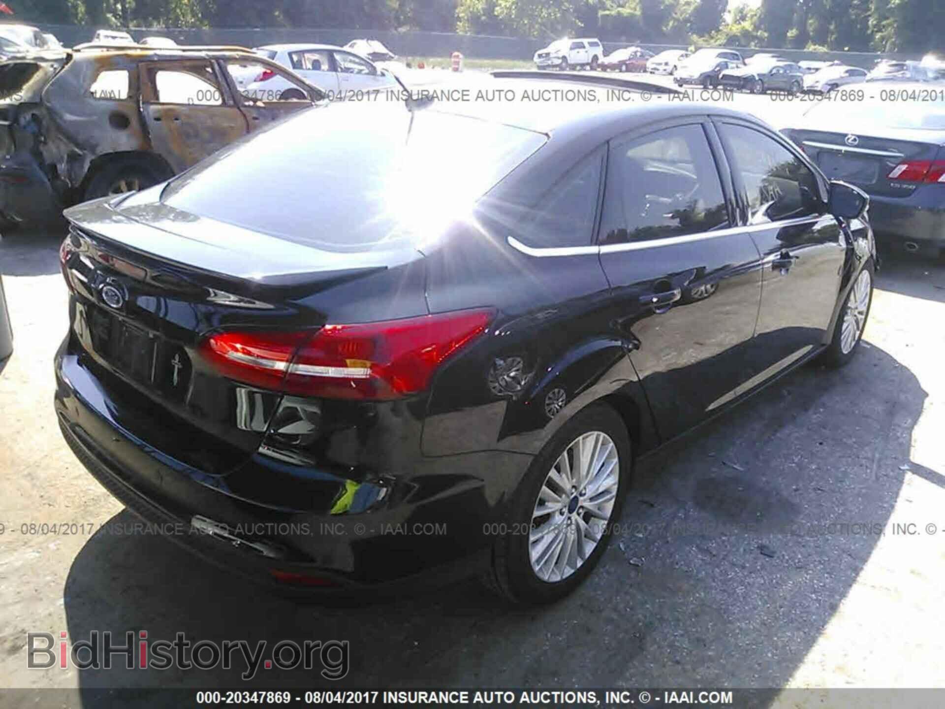 2016 Ford Focus - VIN: 1FADP3J29GL274374 - Фото 4