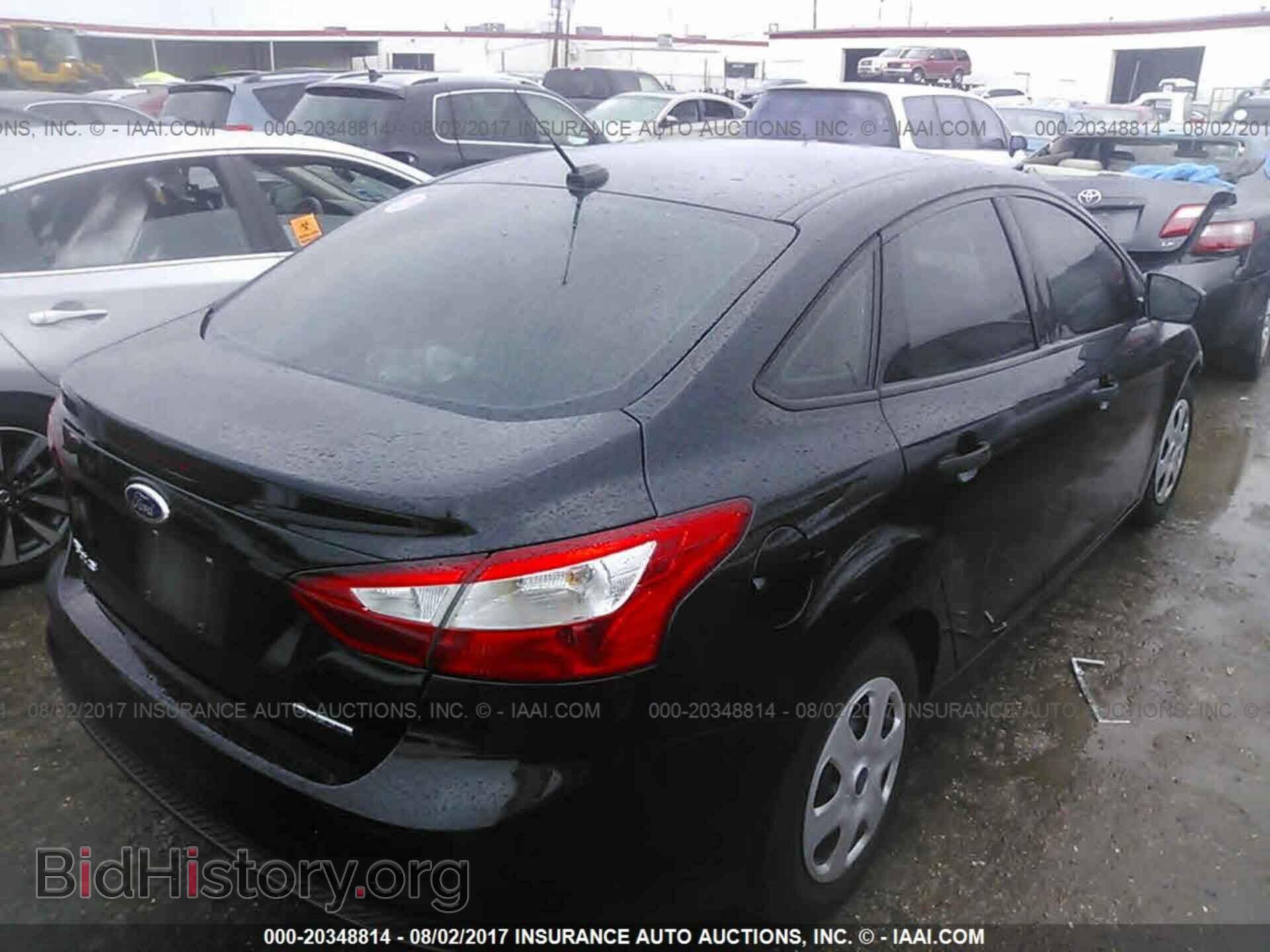 2014 Ford Focus - VIN: 1FADP3E23EL246786 - Photo 4