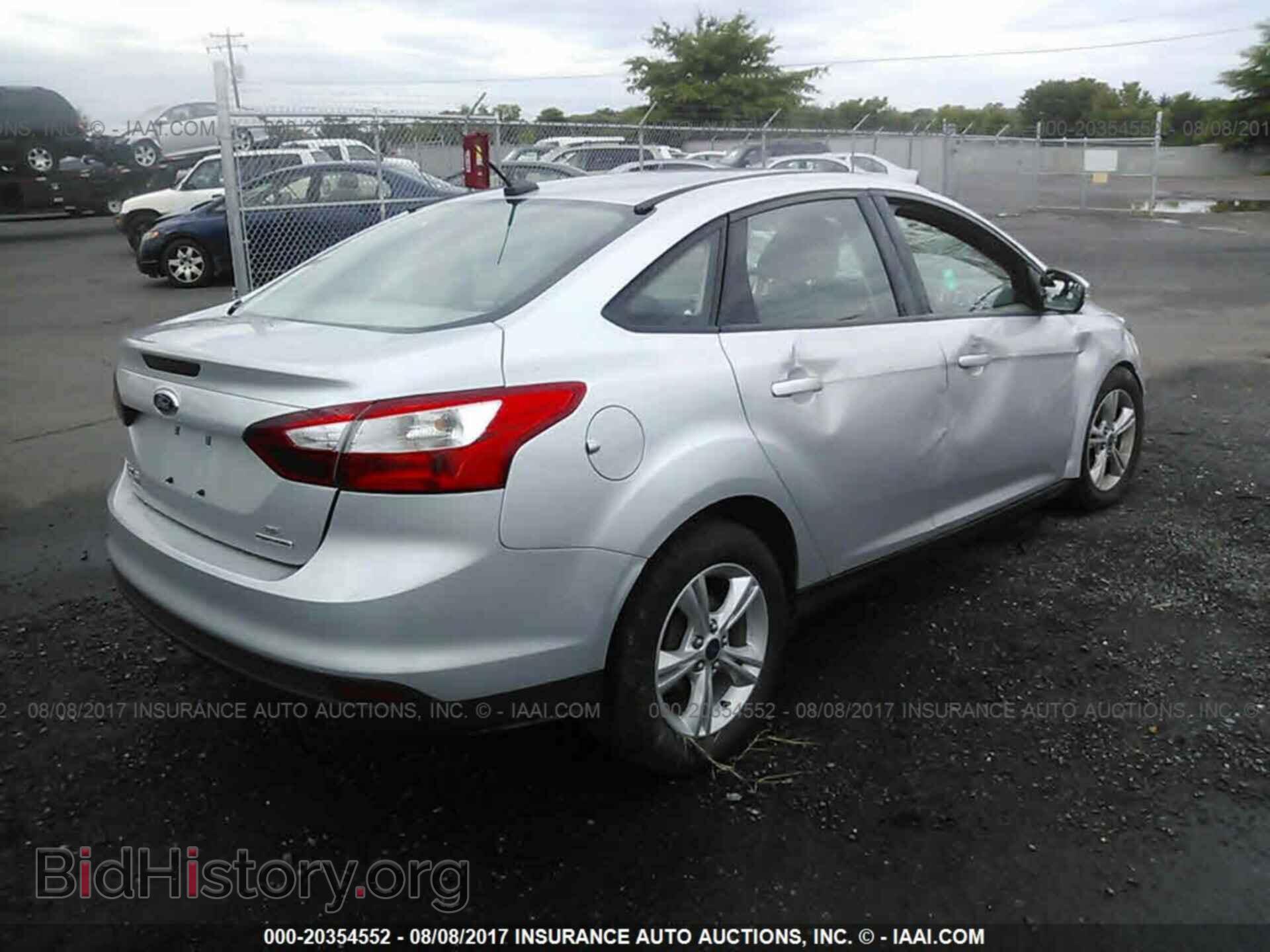 2014 Ford Focus - VIN: 1FADP3F25EL360514 - Photo 4