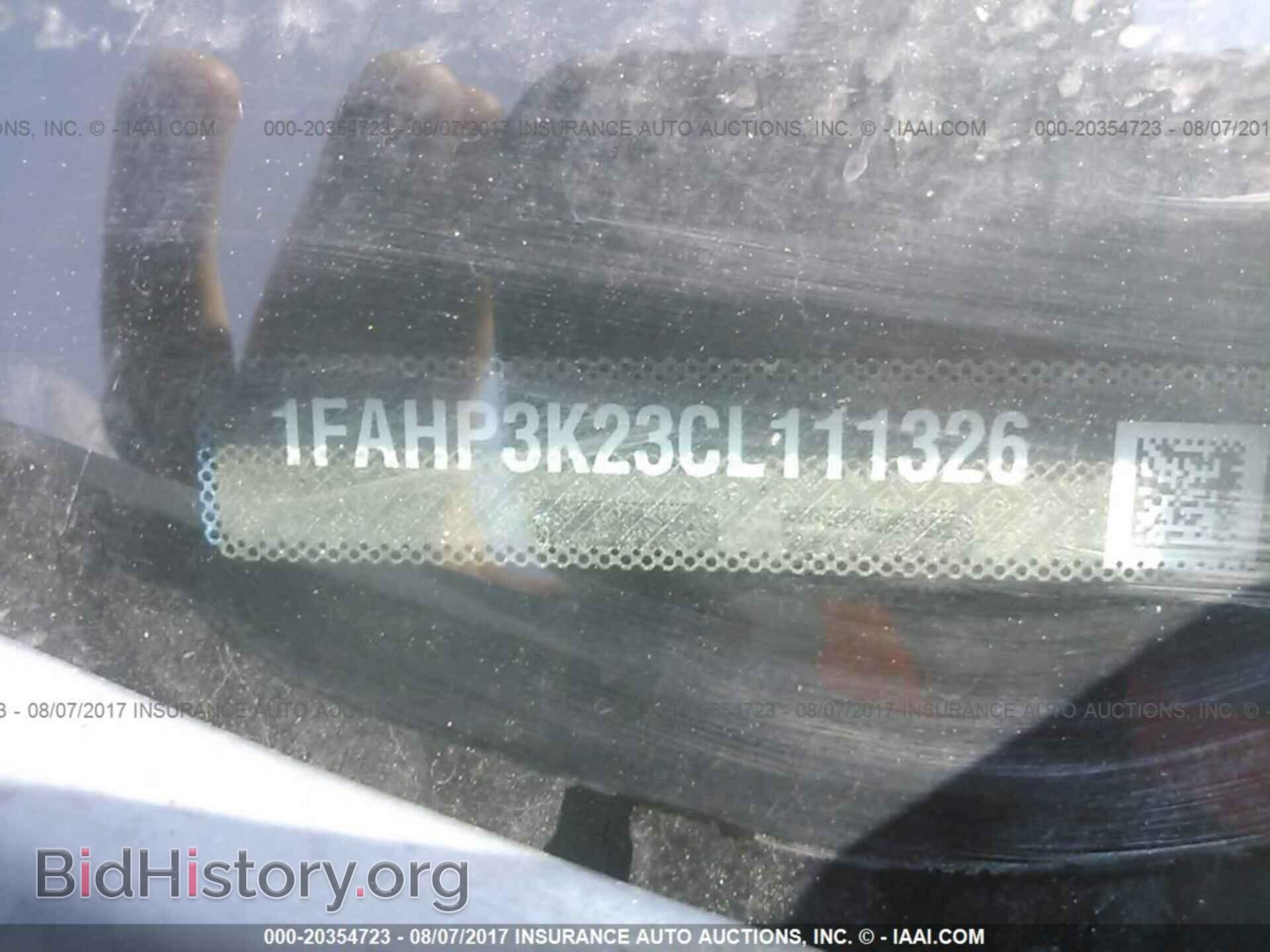 2012 Ford Focus - VIN: 1FAHP3K23CL111326 - Фото 9