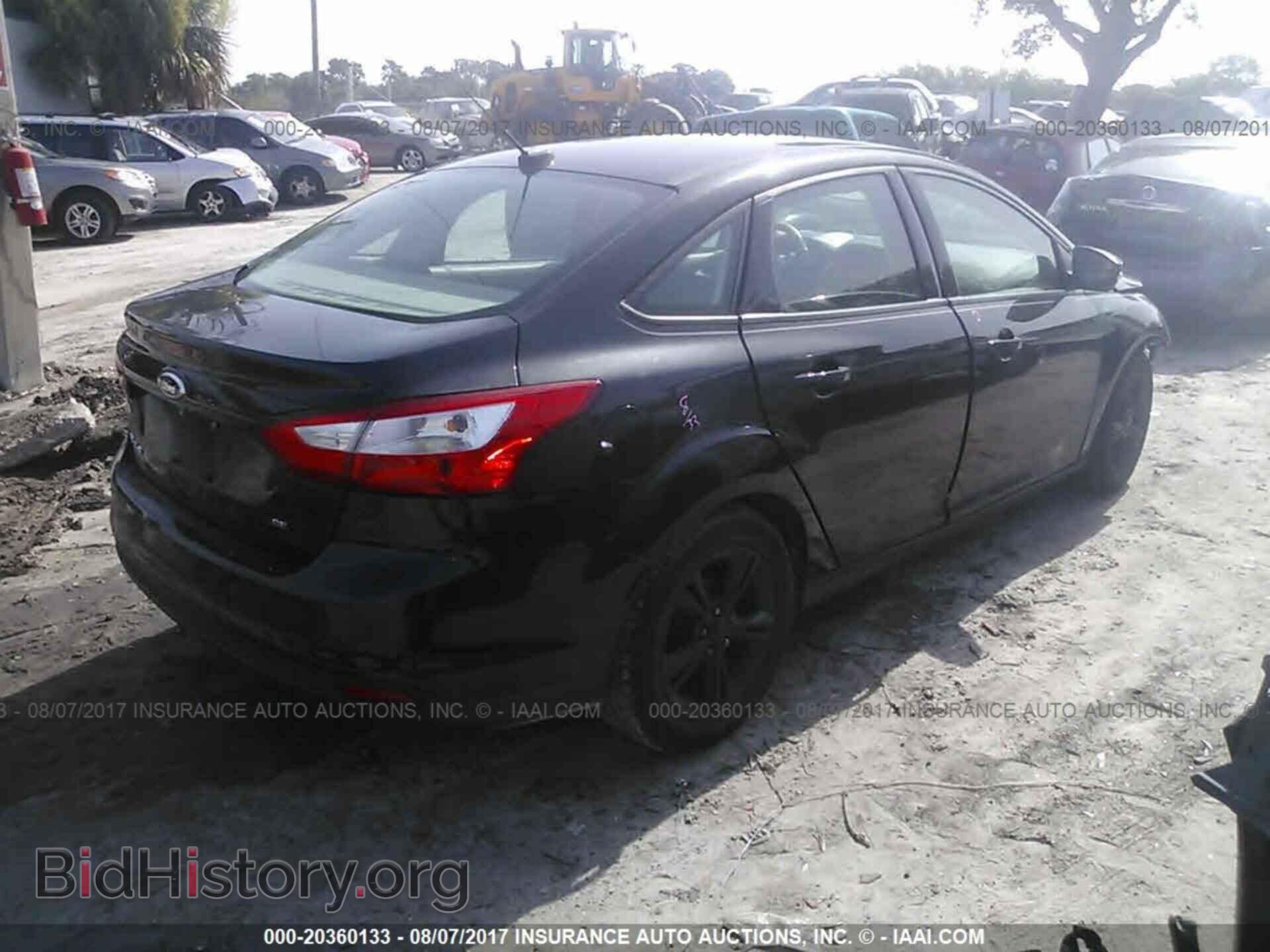 2014 Ford Focus - VIN: 1FADP3F21EL102300 - Фото 4