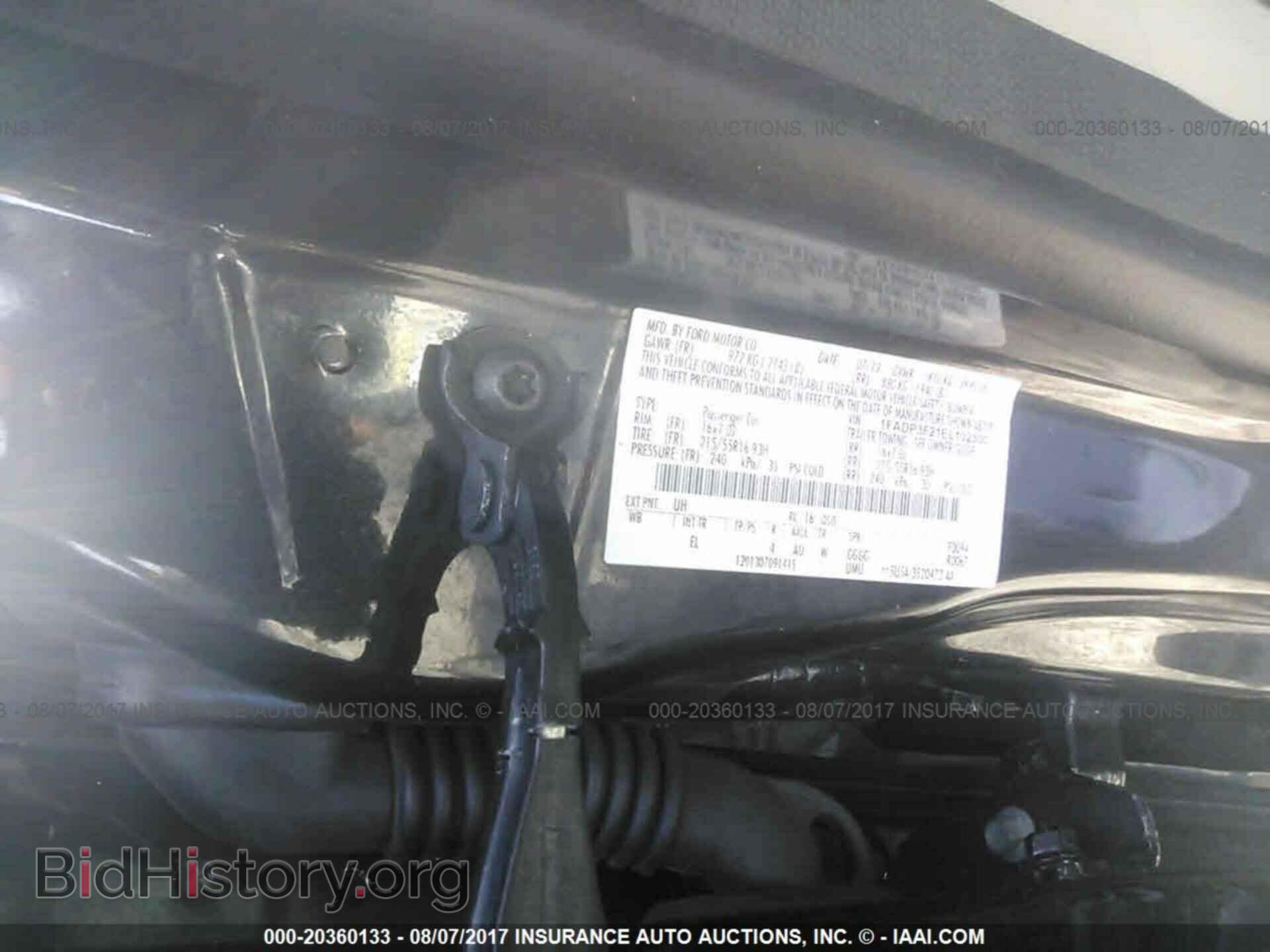 2014 Ford Focus - VIN: 1FADP3F21EL102300 - Фото 9