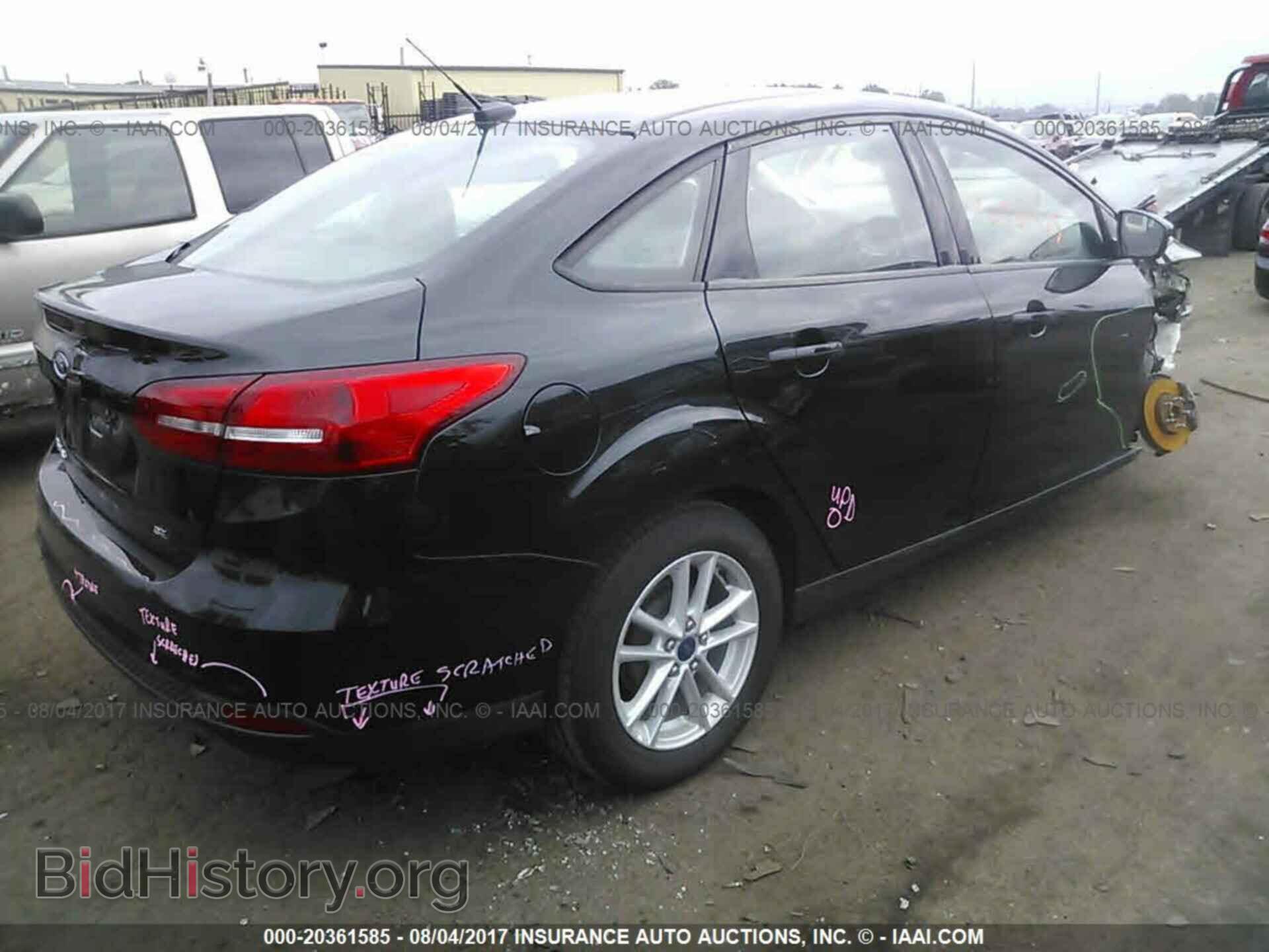 2015 Ford Focus - VIN: 1FADP3F22FL205257 - Photo 4