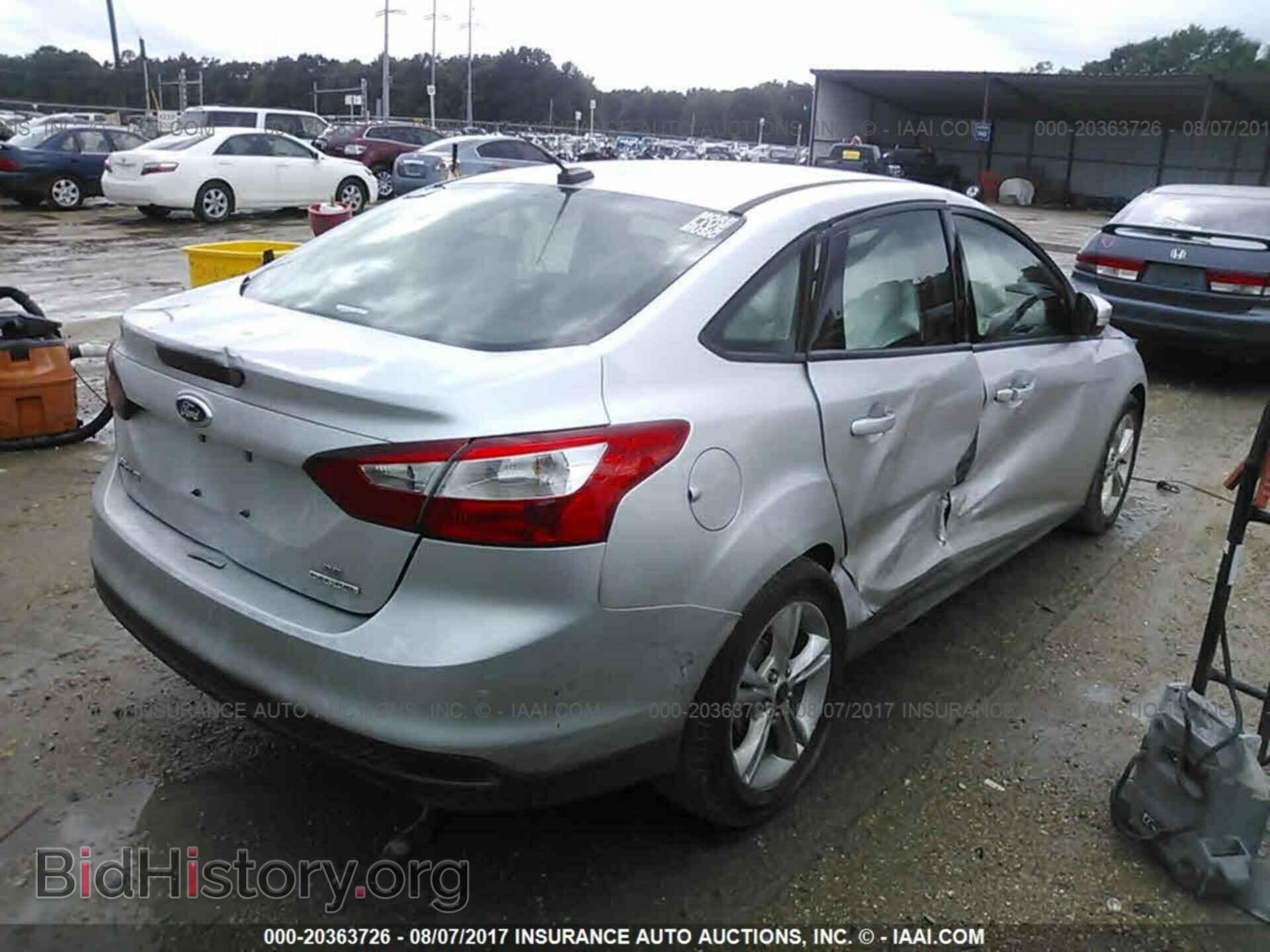 2014 Ford Focus - VIN: 1FADP3F20EL333107 - Фото 4