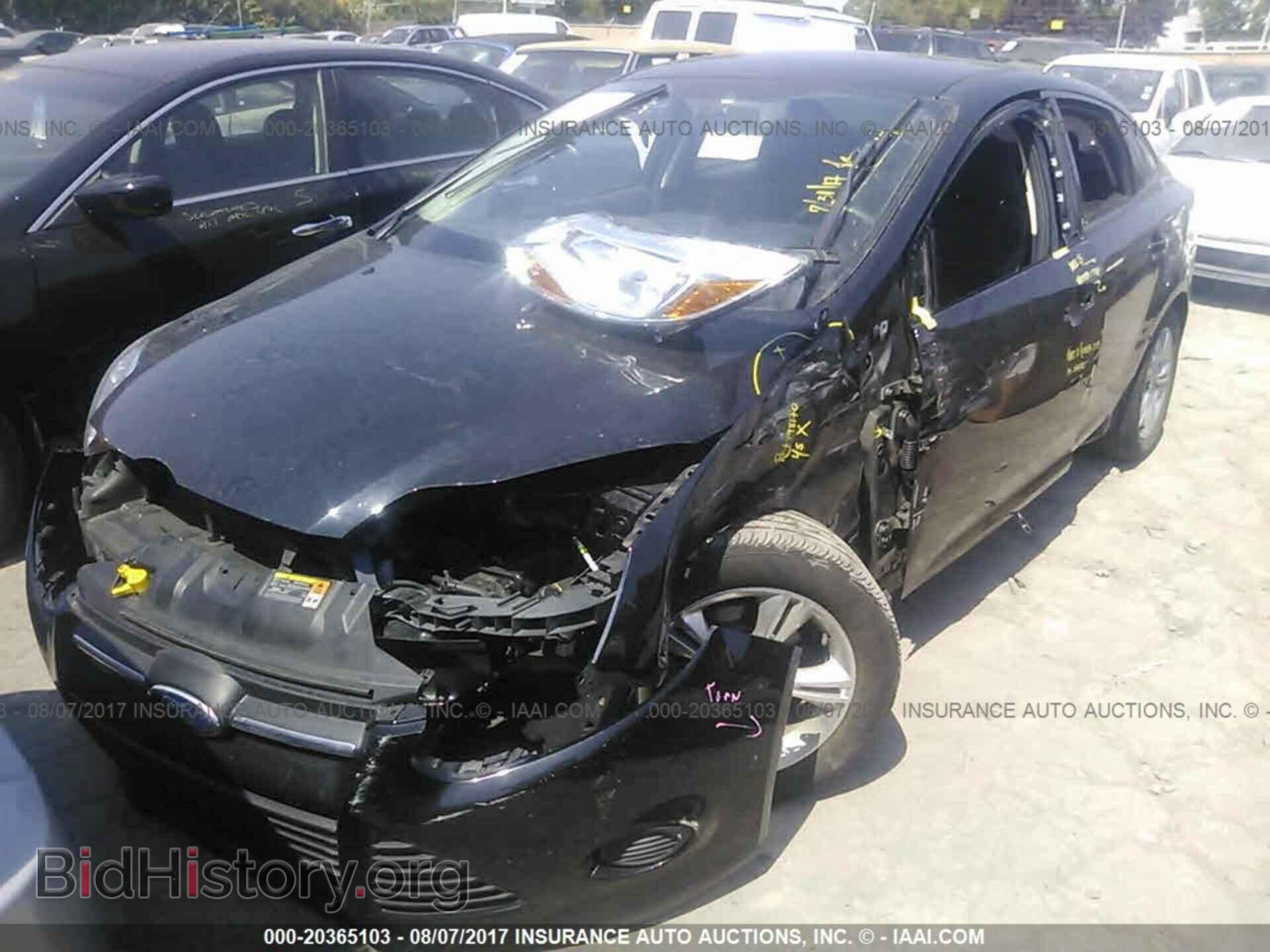 2014 Ford Focus - VIN: 1FADP3F24EL259965 - Фото 2