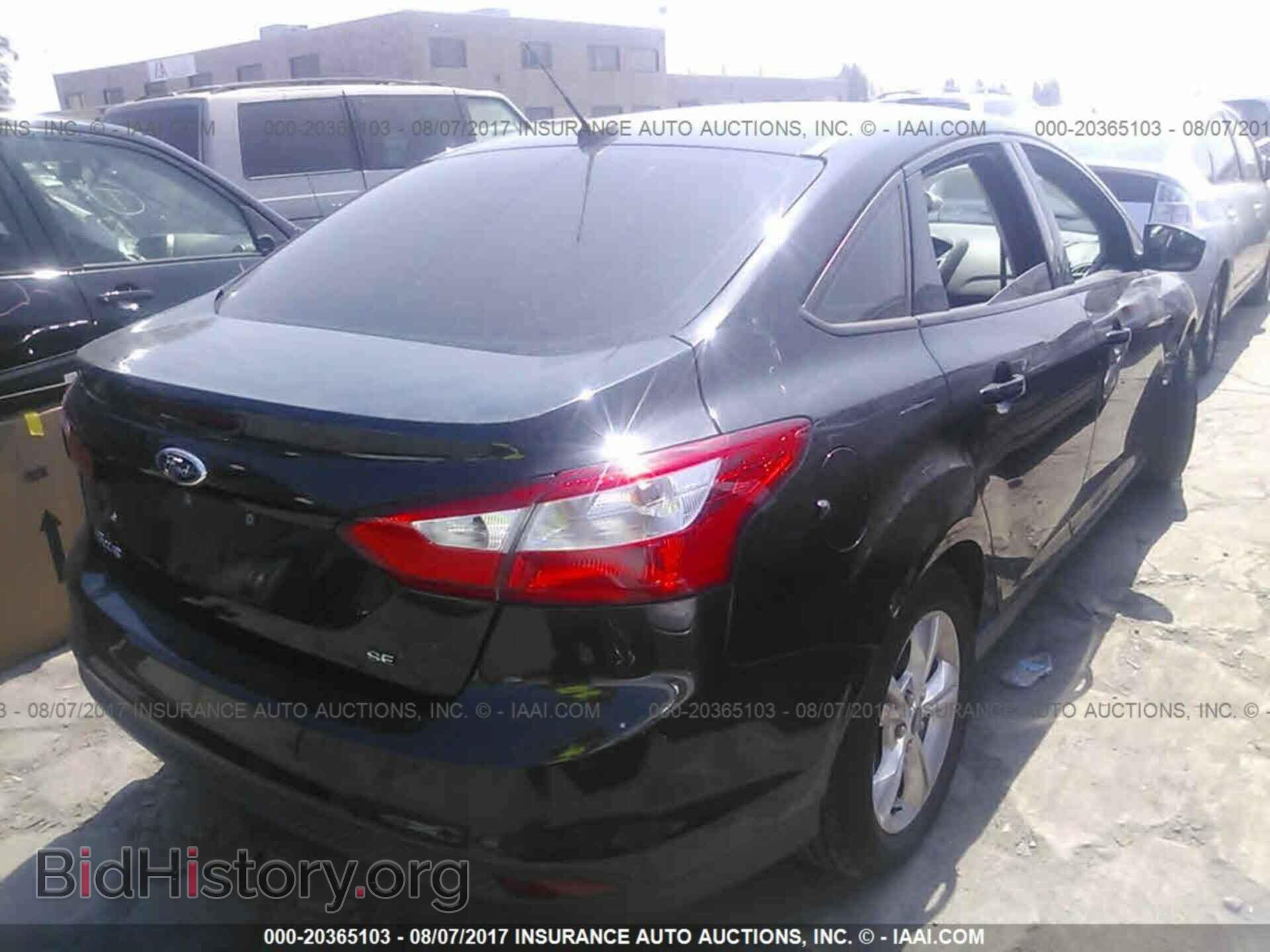 2014 Ford Focus - VIN: 1FADP3F24EL259965 - Фото 4