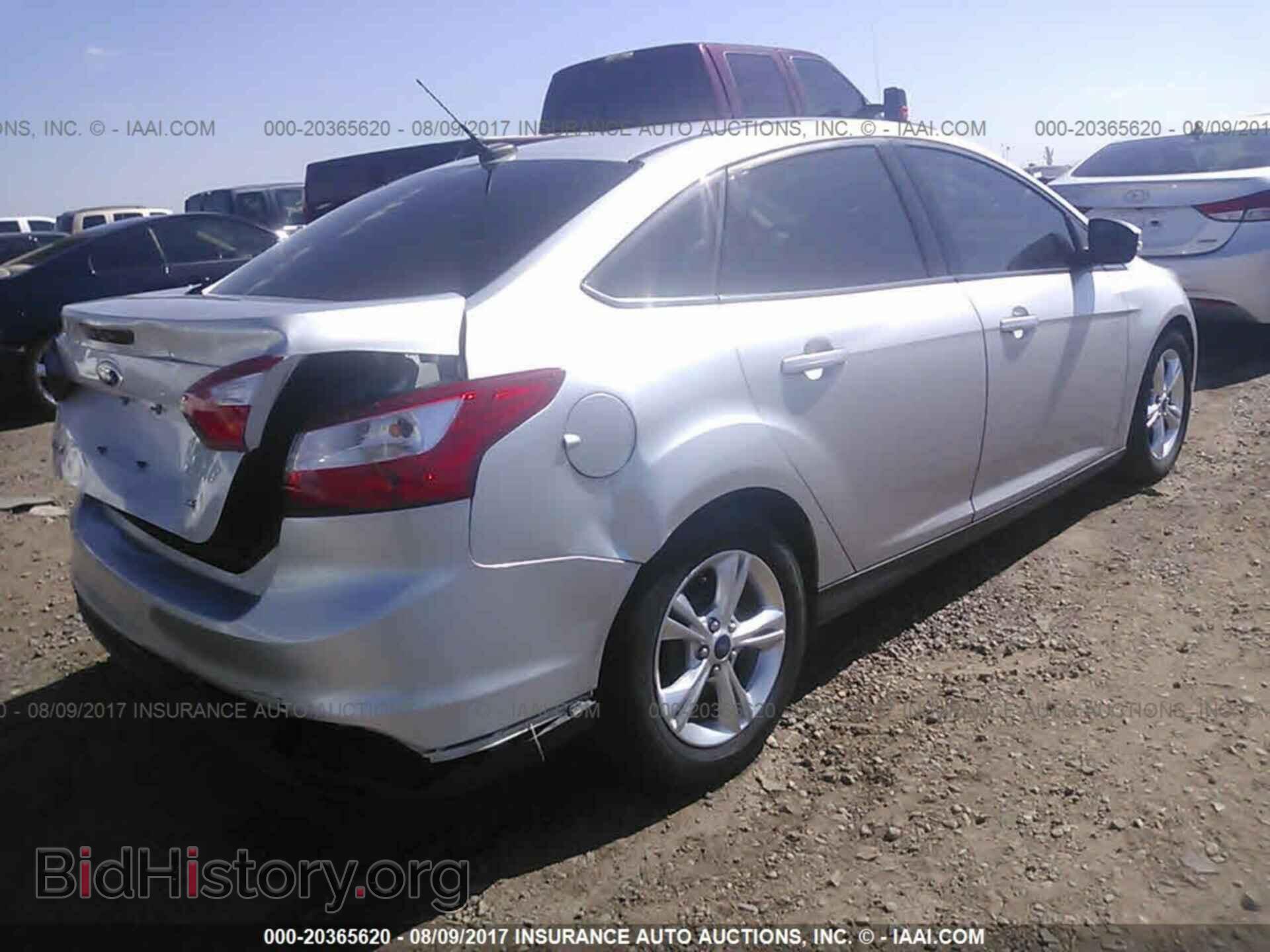 2014 Ford Focus - VIN: 1FADP3F23EL336096 - Фото 4