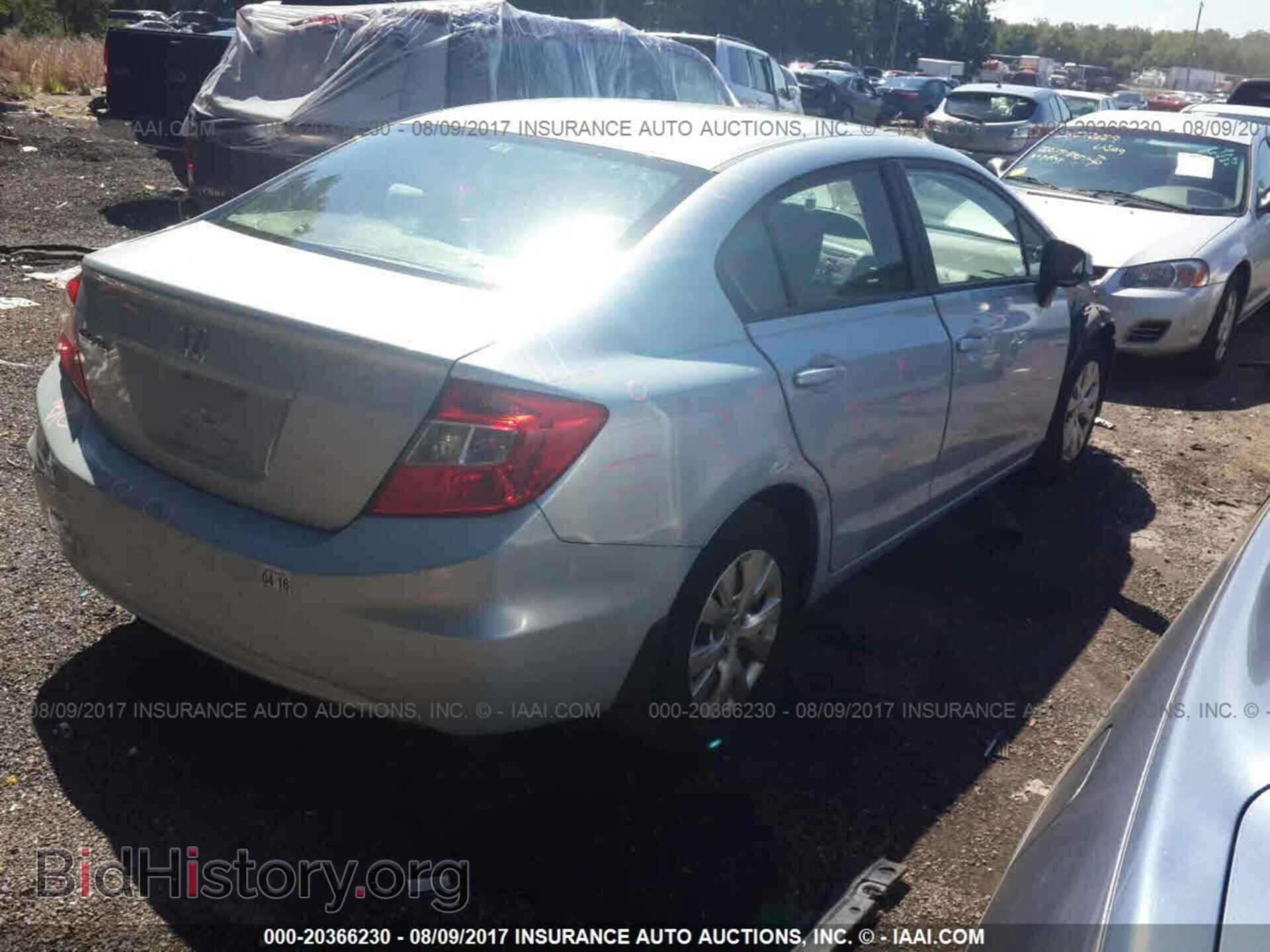 2012 Honda Civic - VIN: 19XFB2F52CE375855 - Фото 4