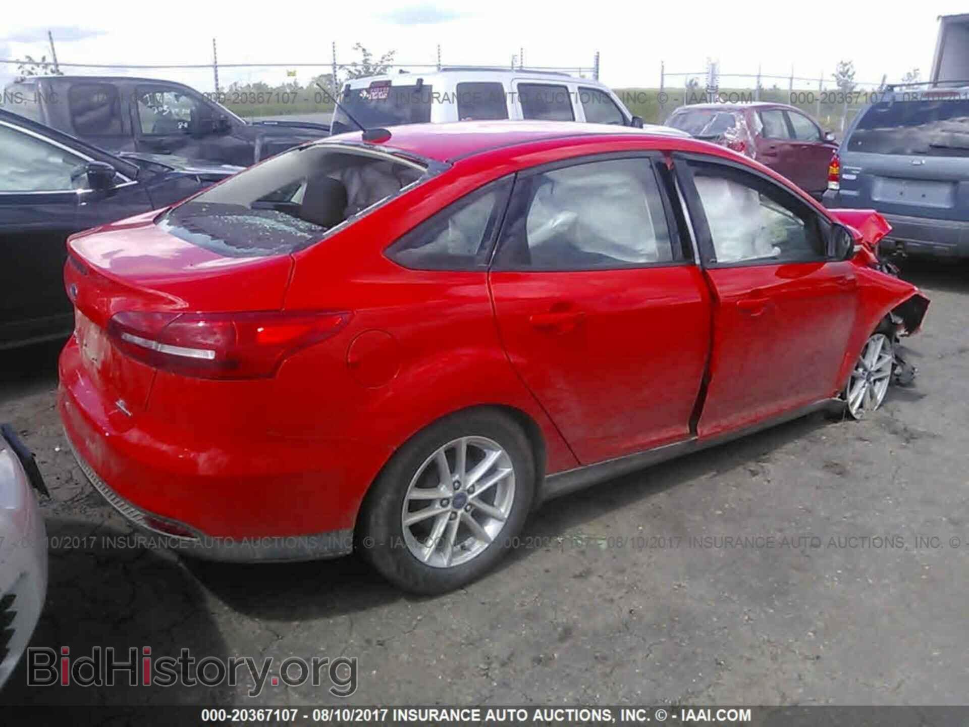 2016 Ford Focus - VIN: 1FADP3F26GL395548 - Photo 4