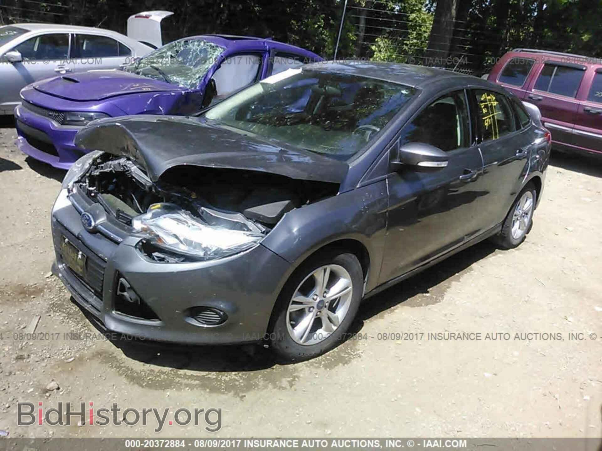 2014 Ford Focus - VIN: 1FADP3F25EL393089 - Фото 2