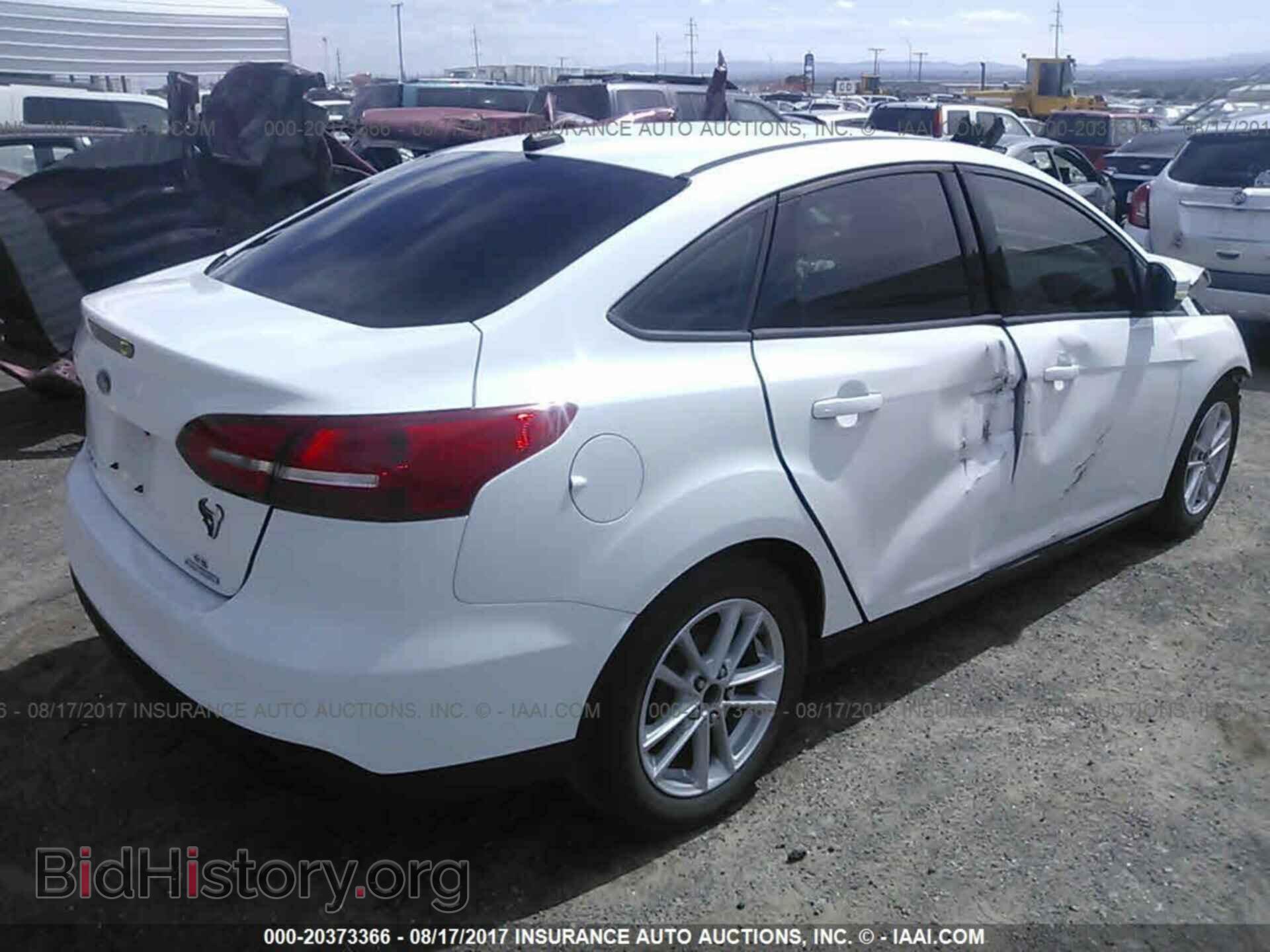 2015 Ford Focus - VIN: 1FADP3F21FL219439 - Photo 4