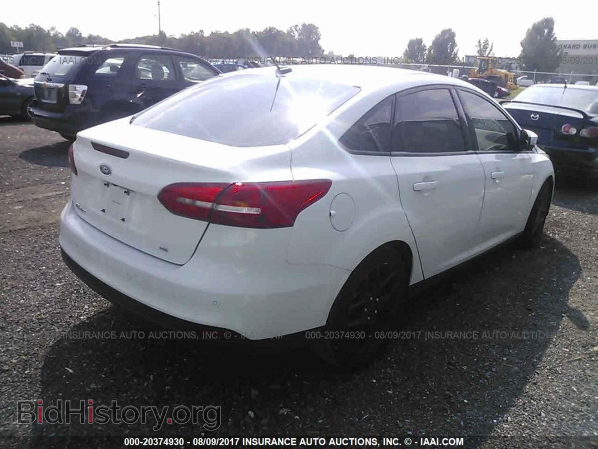 2016 Ford Focus - VIN: 1FADP3F21GL354518 - Photo 4