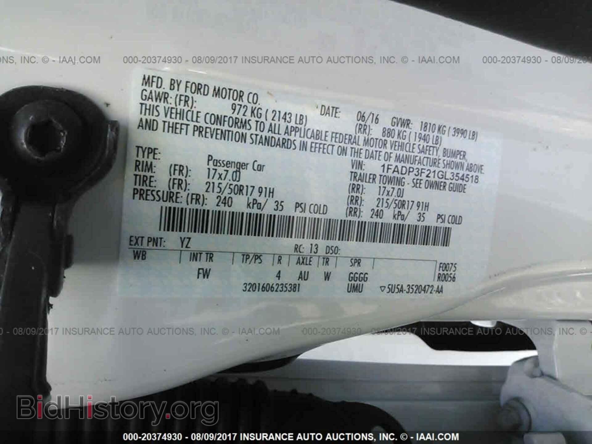 2016 Ford Focus - VIN: 1FADP3F21GL354518 - Photo 9