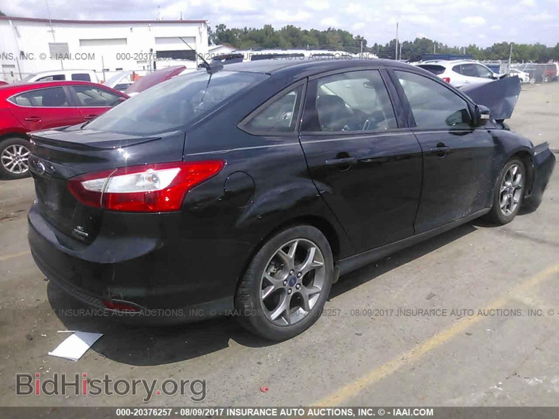 2014 Ford Focus - VIN: 1FADP3F23EL387209 - Фото 4
