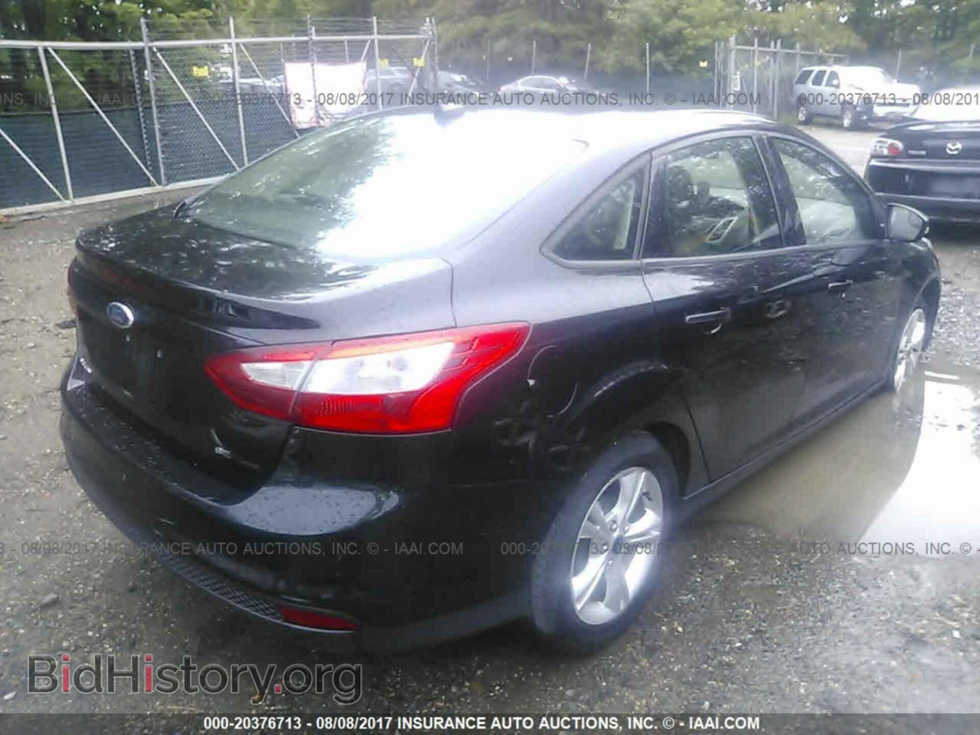 2014 Ford Focus - VIN: 1FADP3F22EL248933 - Photo 4