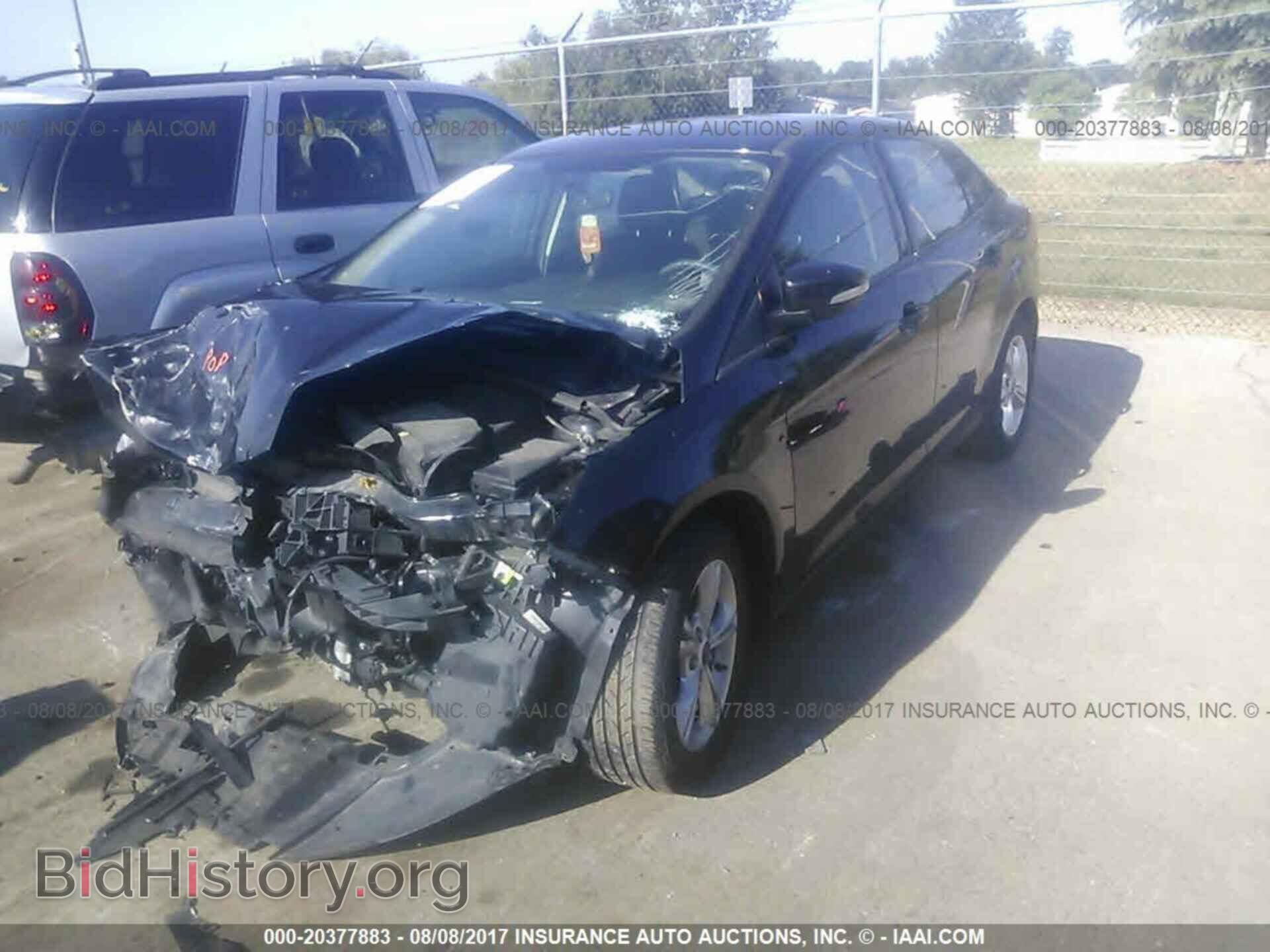 2014 Ford Focus - VIN: 1FADP3F22EL316521 - Фото 2