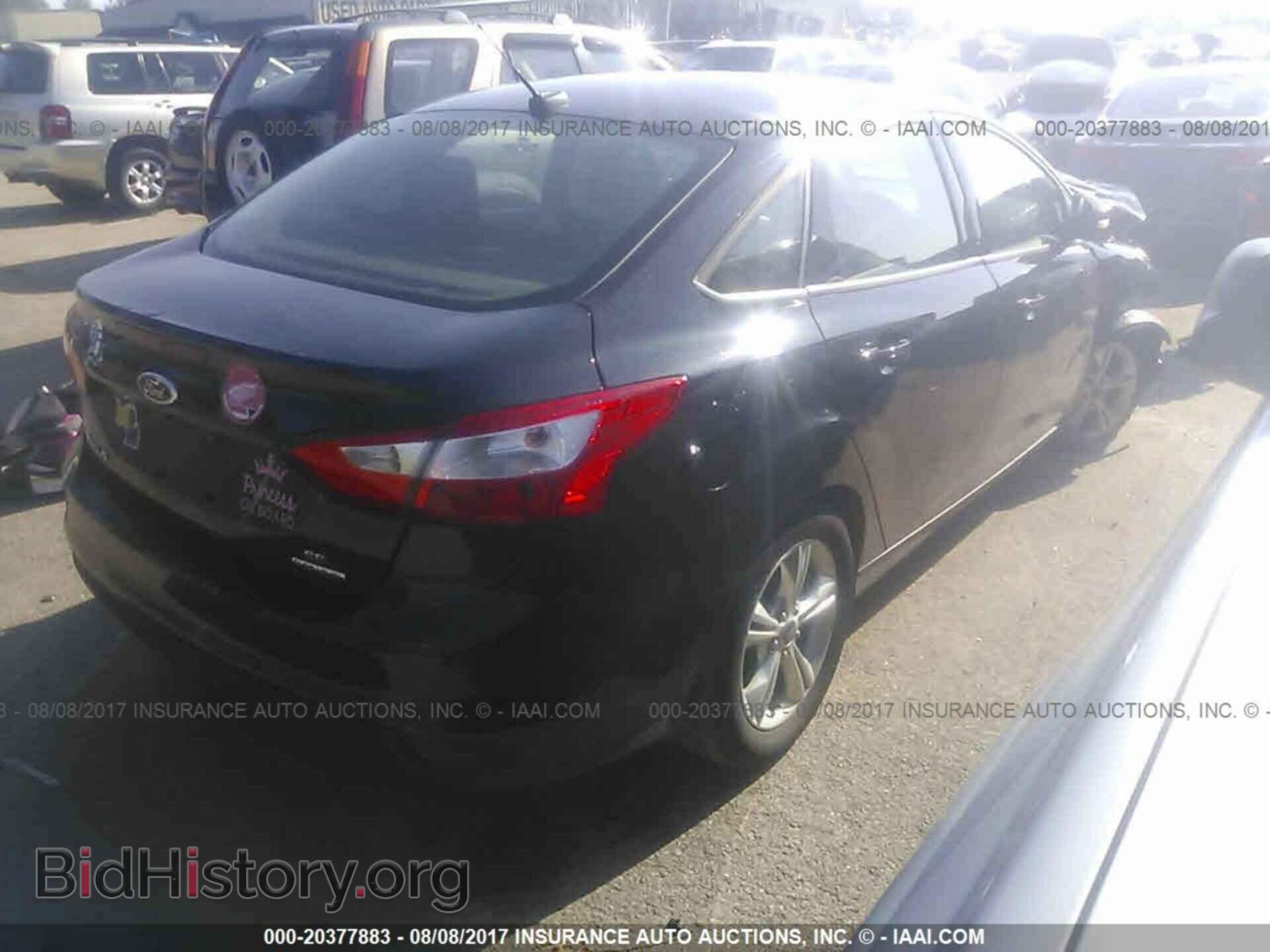 2014 Ford Focus - VIN: 1FADP3F22EL316521 - Фото 4