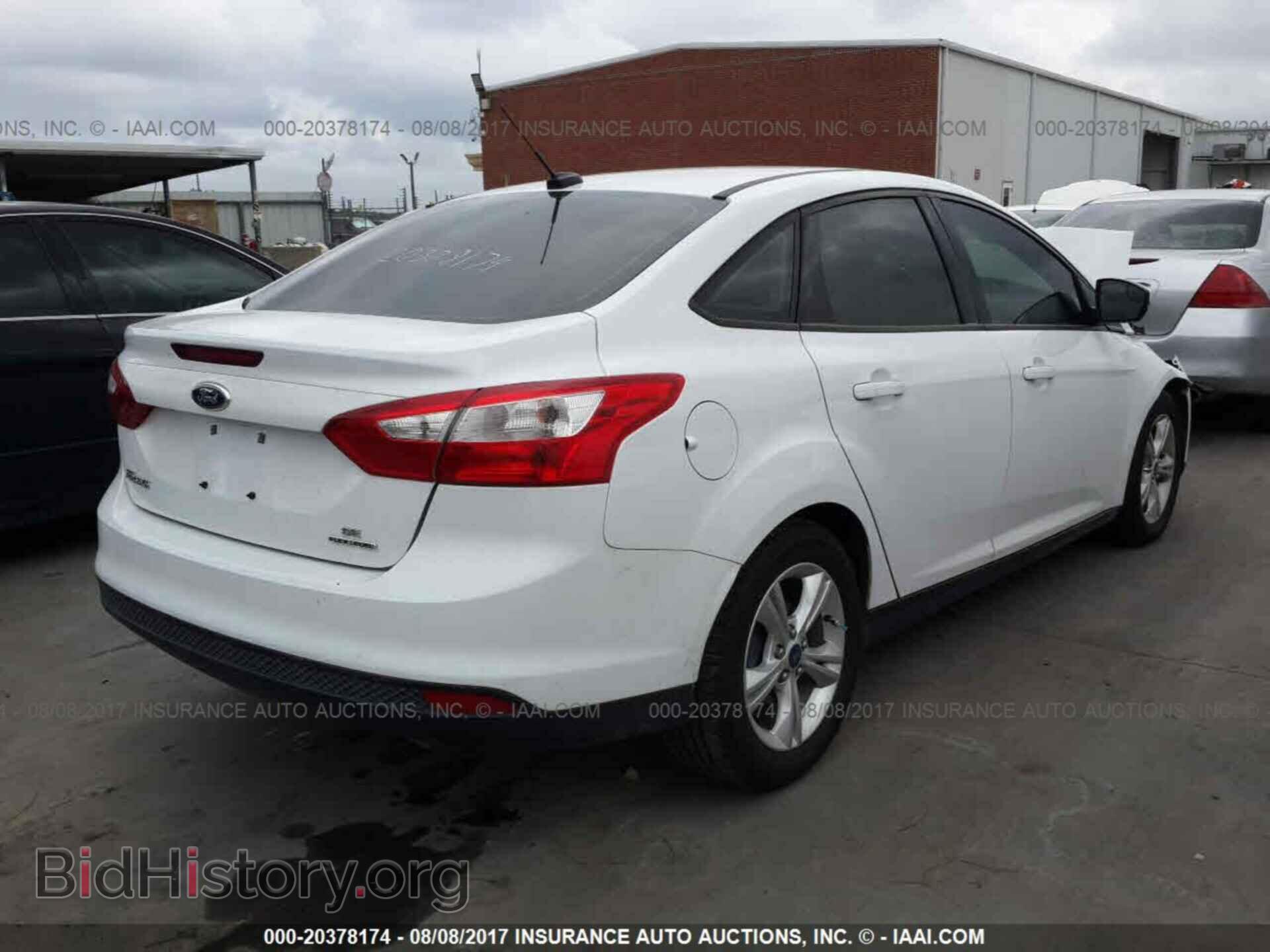 2014 Ford Focus - VIN: 1FADP3F29EL218540 - Фото 4