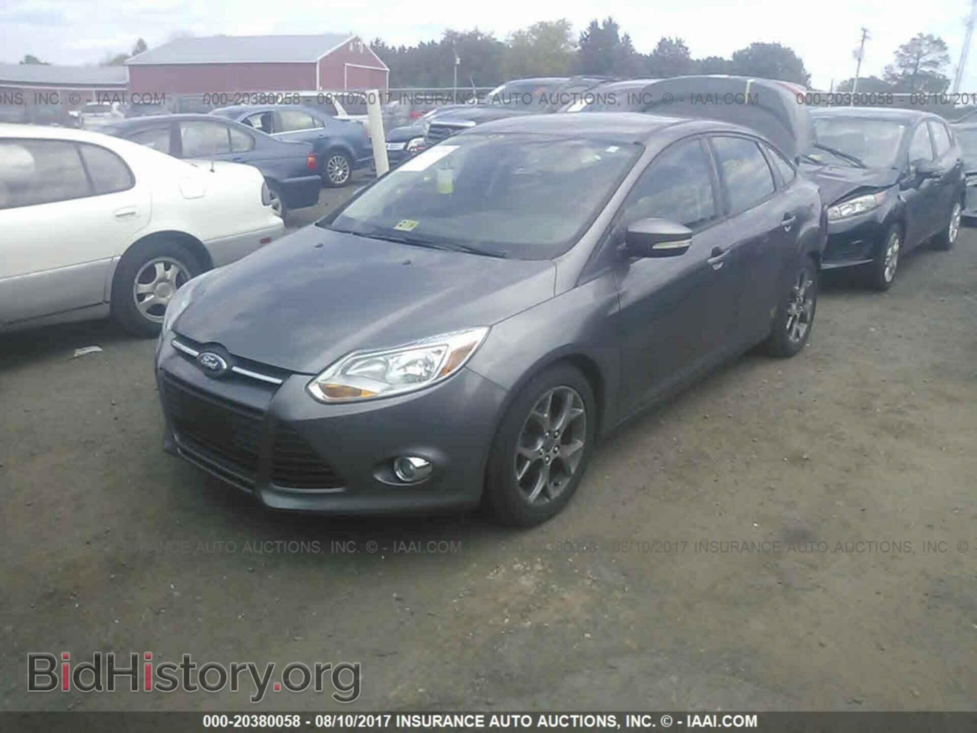 2014 Ford Focus - VIN: 1FADP3F28EL127517 - Фото 2