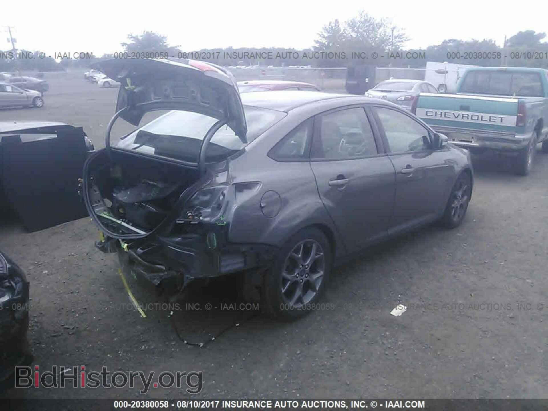2014 Ford Focus - VIN: 1FADP3F28EL127517 - Фото 4