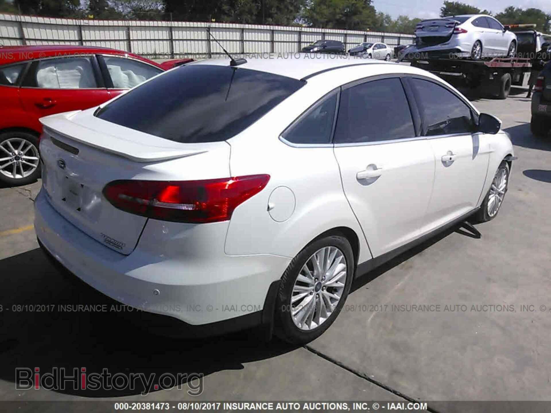 2016 Ford Focus - VIN: 1FADP3J20GL212345 - Фото 4