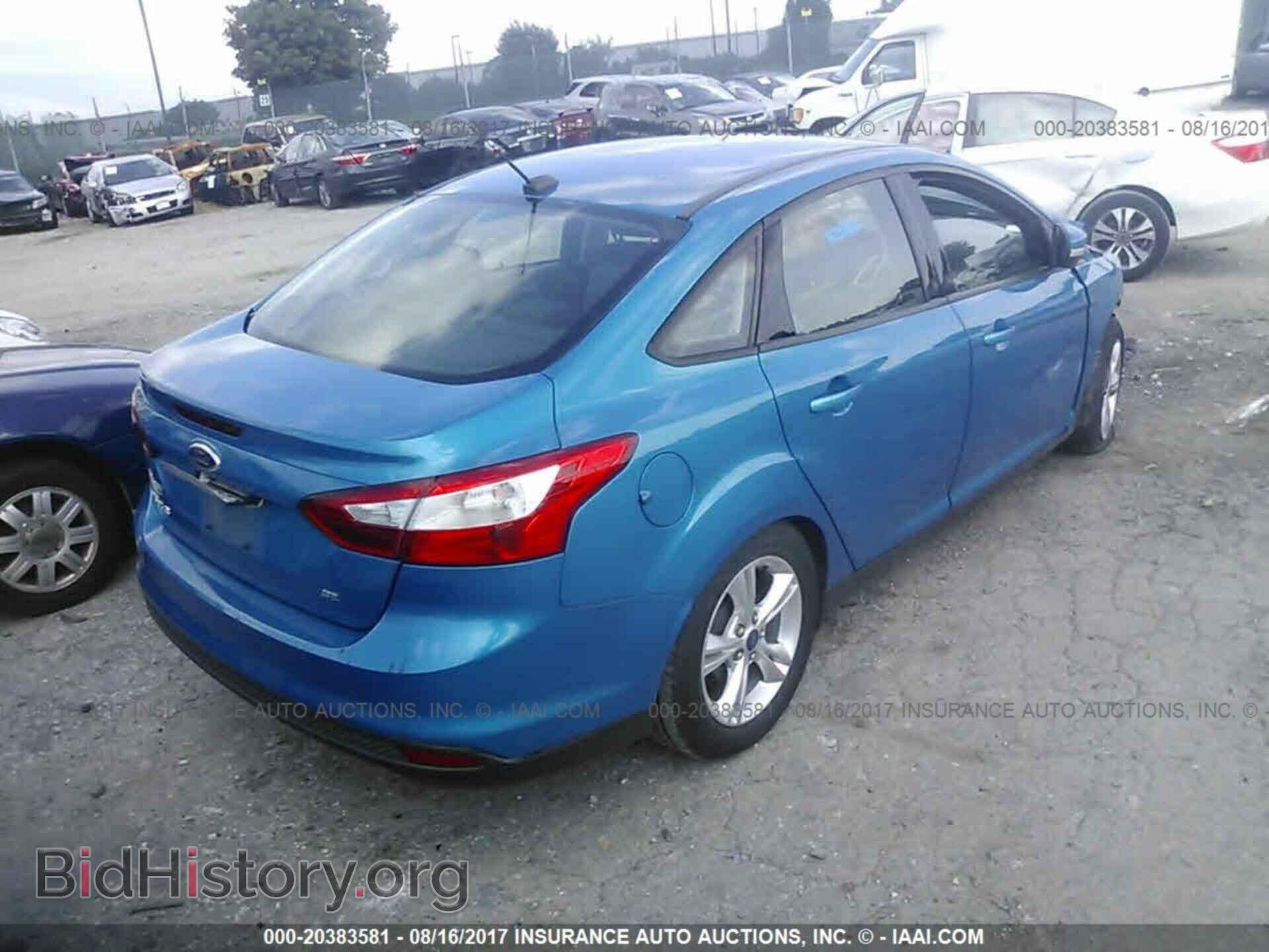 2014 Ford Focus - VIN: 1FADP3F20EL297712 - Photo 4