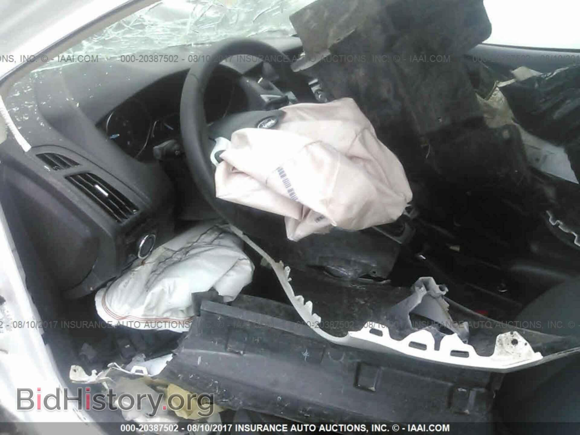 2014 Ford Focus - VIN: 1FADP3F24EL291038 - Фото 5