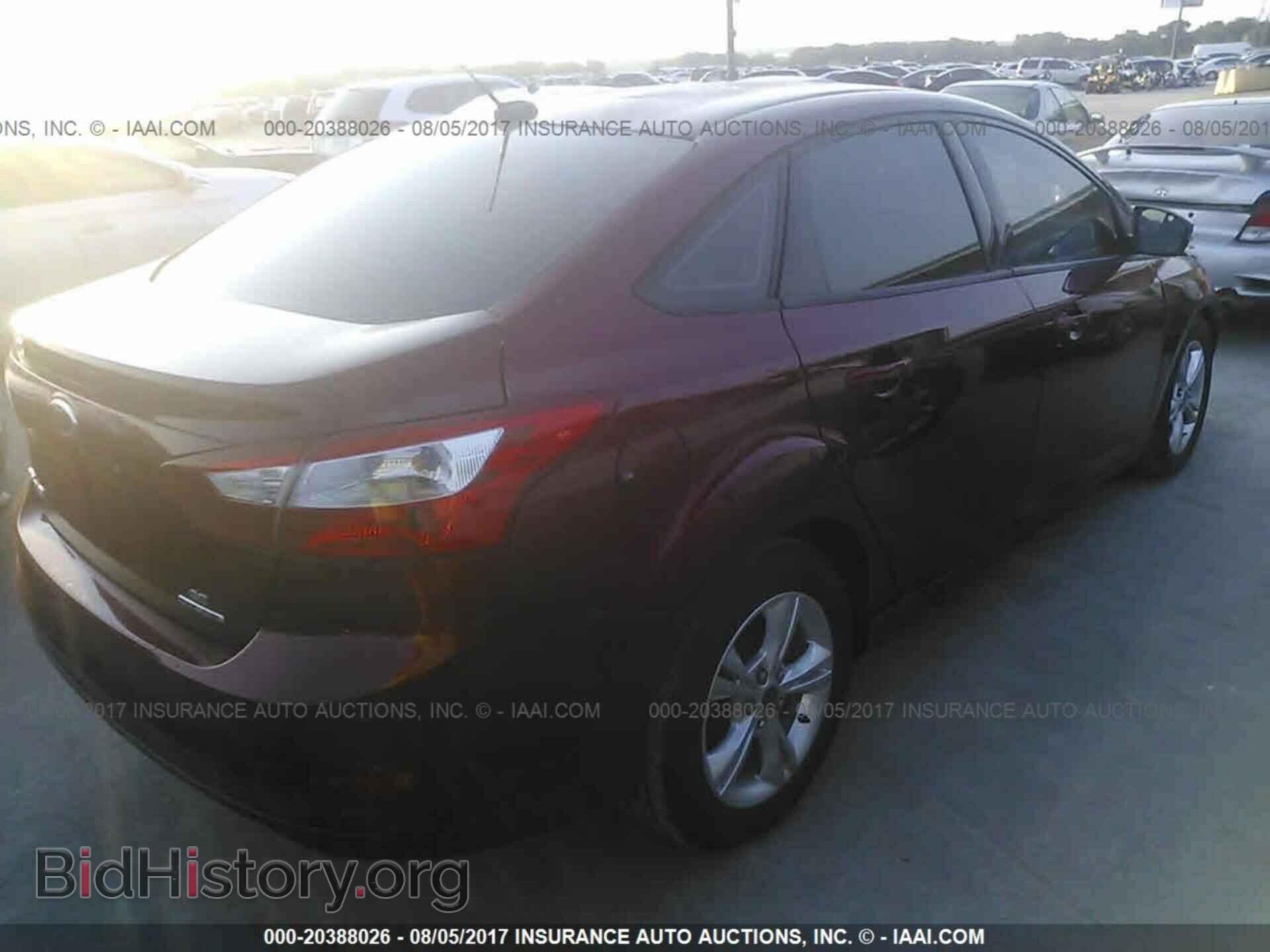 2014 Ford Focus - VIN: 1FADP3F20EL208656 - Photo 4