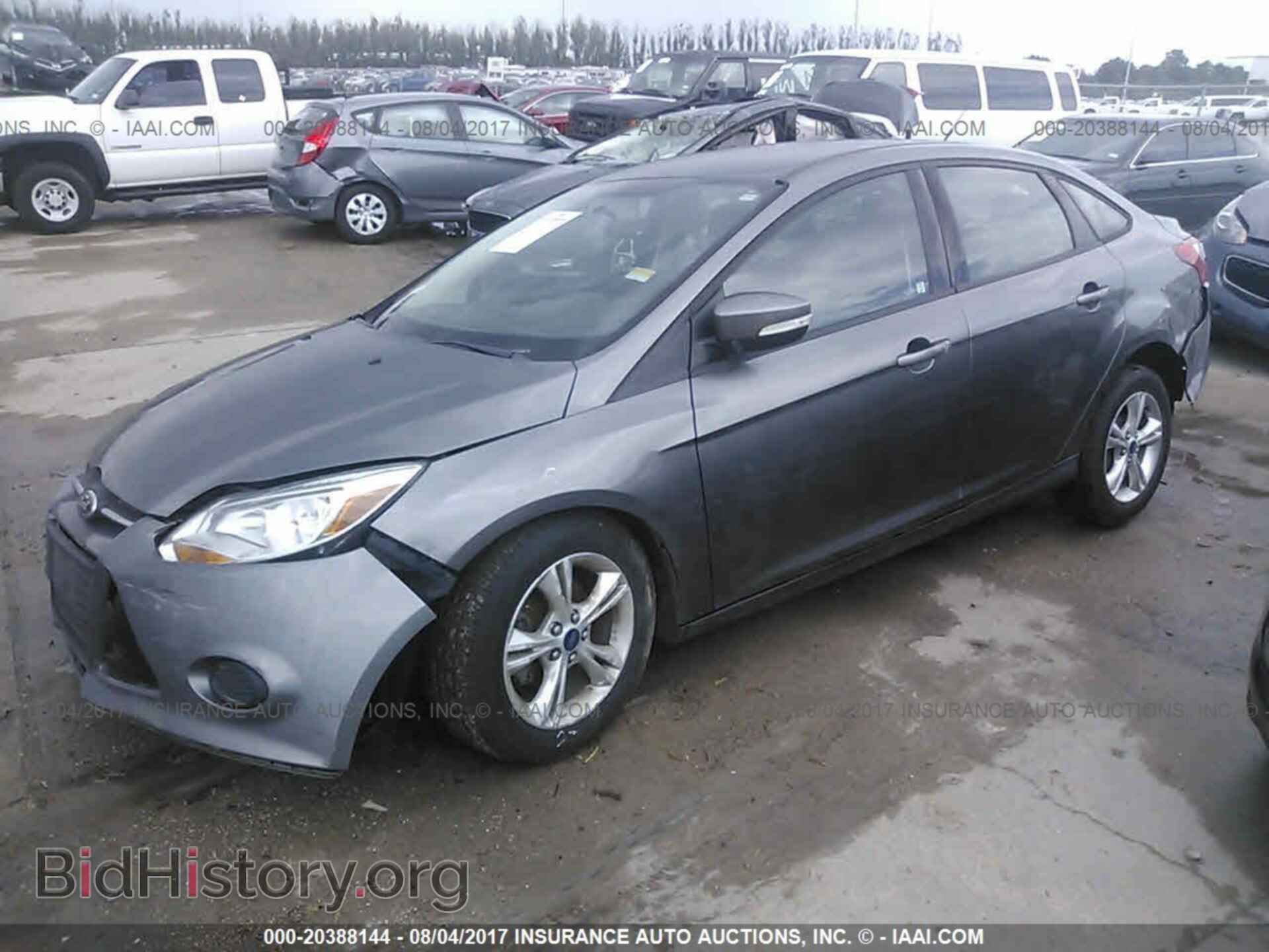 2014 Ford Focus - VIN: 1FADP3F26EL108884 - Фото 2