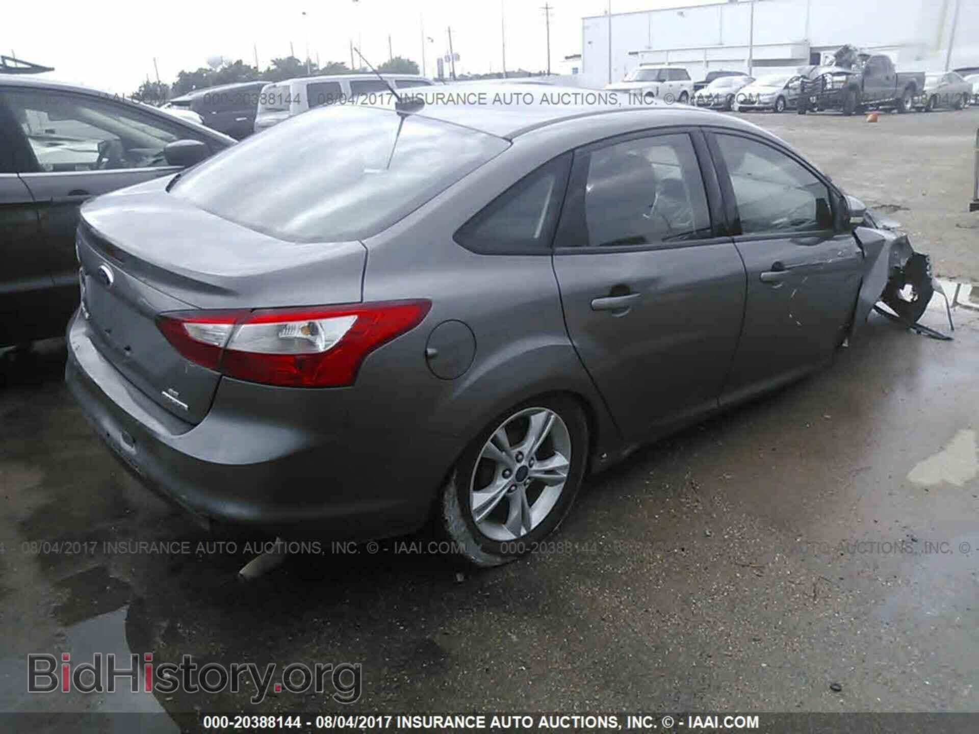 2014 Ford Focus - VIN: 1FADP3F26EL108884 - Фото 4