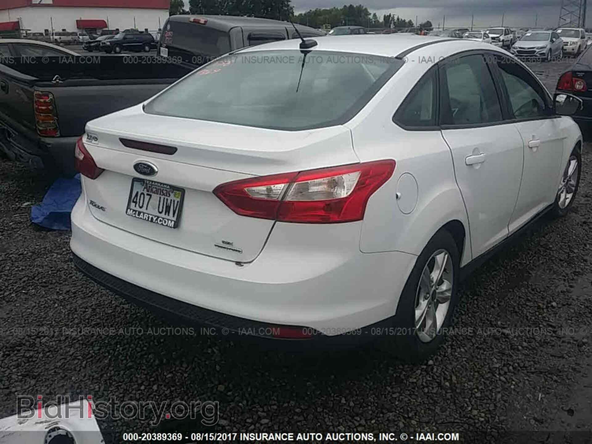 2014 Ford Focus - VIN: 1FADP3F23EL266082 - Фото 4