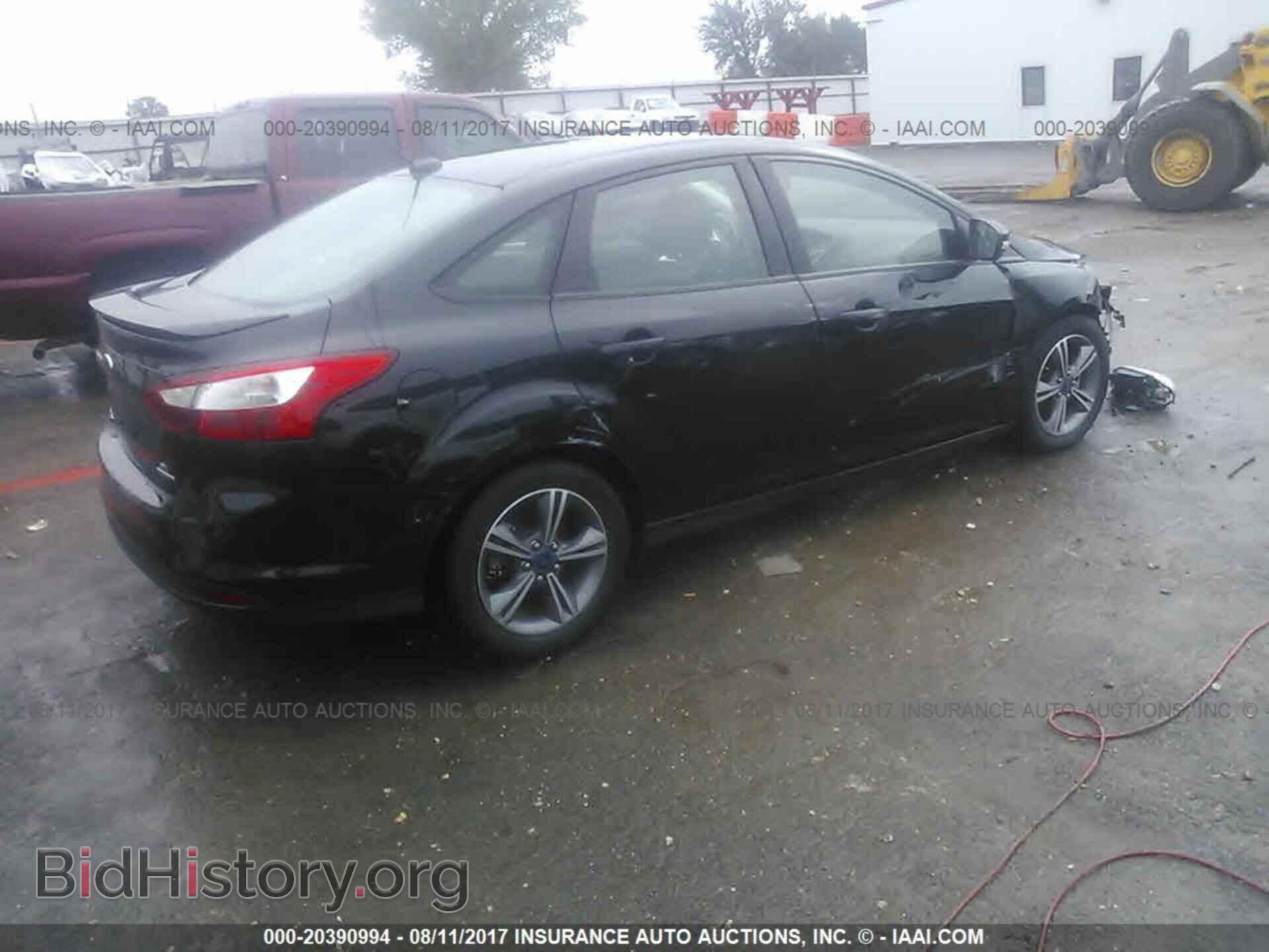 2014 Ford Focus - VIN: 1FADP3F2XEL240563 - Photo 4