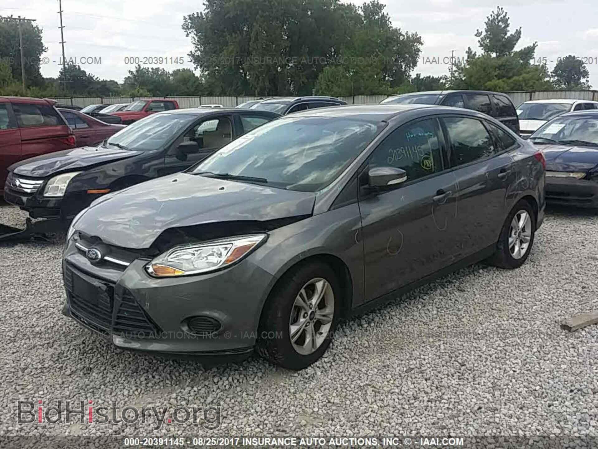 2014 Ford Focus - VIN: 1FADP3F29EL285283 - Фото 2