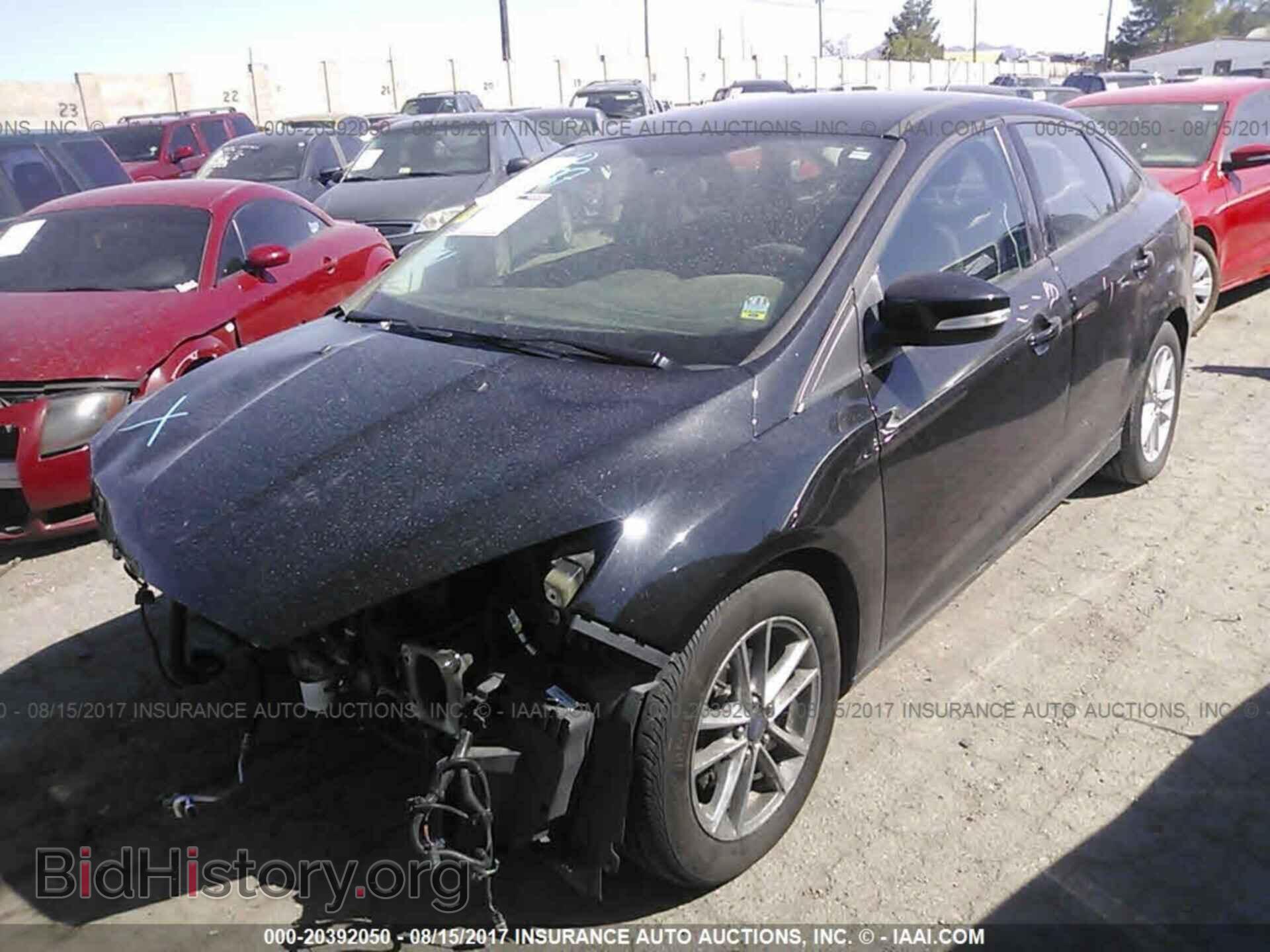 2015 Ford Focus - VIN: 1FADP3F21FL256460 - Photo 2